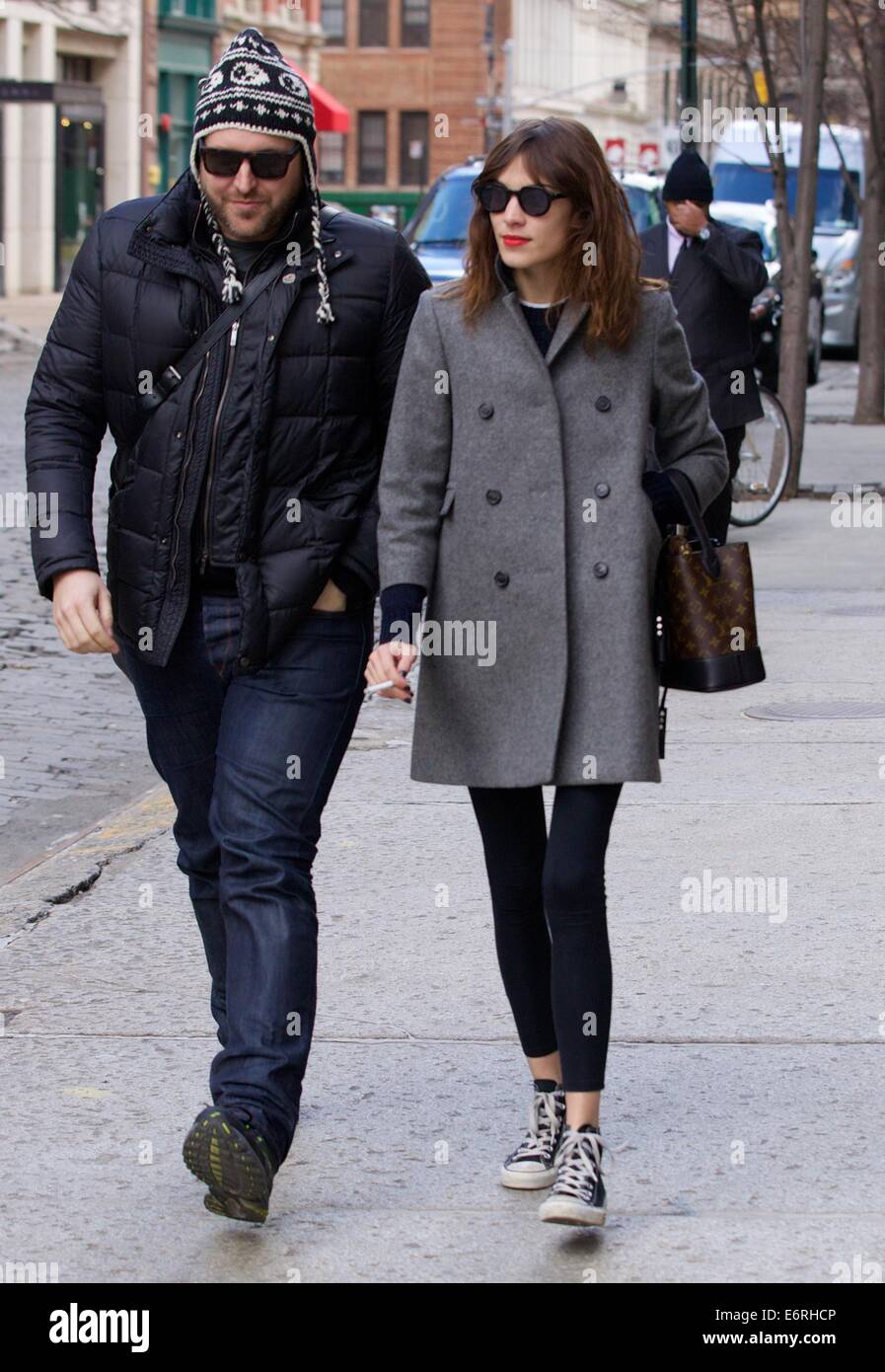 Alexa Chung smoking a cigarette in the East Village as she walks with a  friend Featuring: Alexa Chung Where: New York City, New York, United States  When: 24 Feb 2014 Stock Photo - Alamy