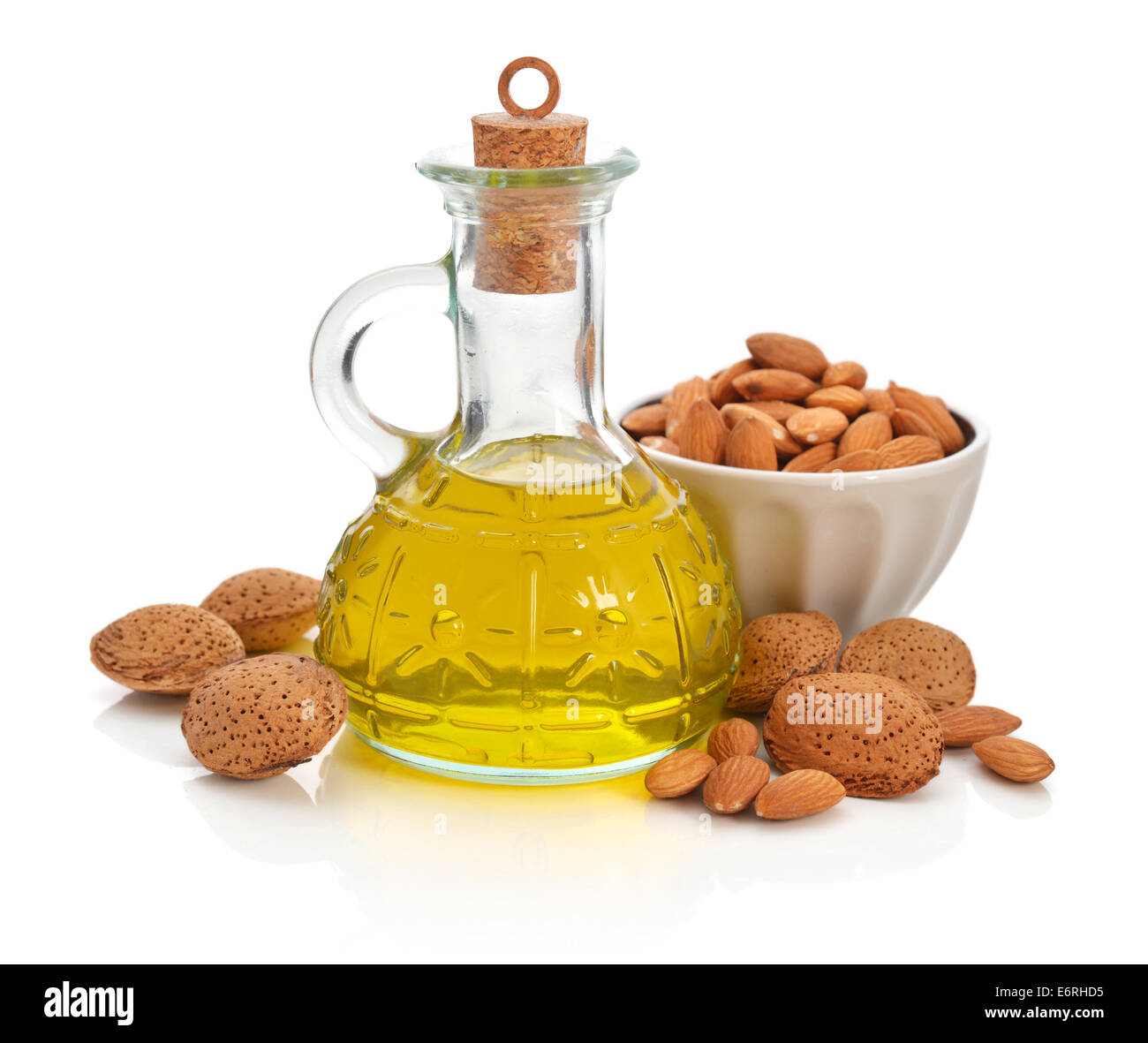 Almonds oil in bottle isolated on white background Stock Photo Alamy