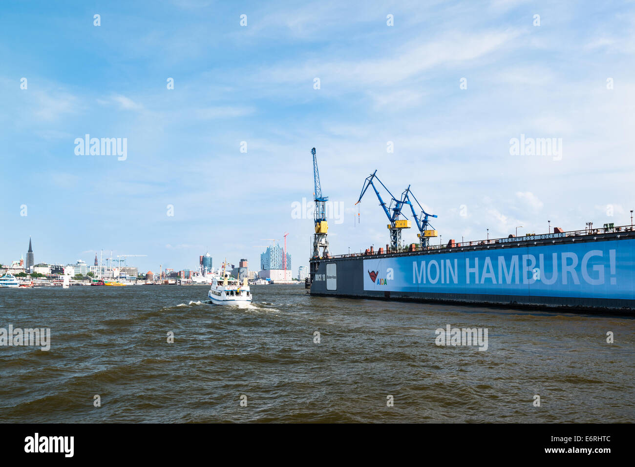 HAMBURG, GERMANY - JULY 21, 2014: The famous Blohm And Voss drydock number 10 with a banner stating “Moin (local slang for Good Stock Photo