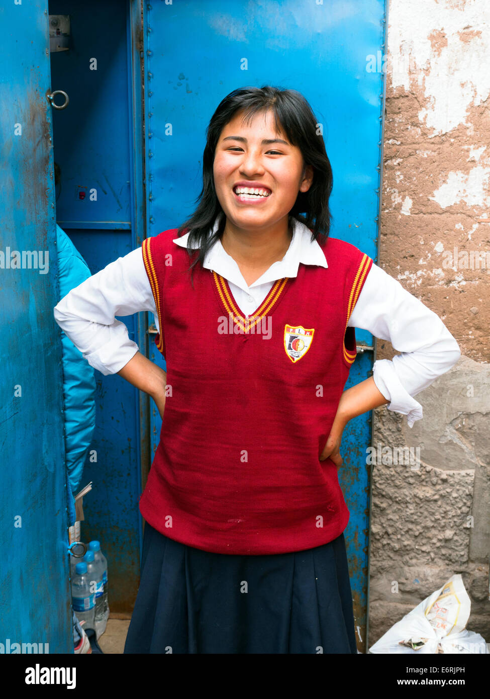 Local smiling girl in school uniform - Cusco, Peru Stock Photo