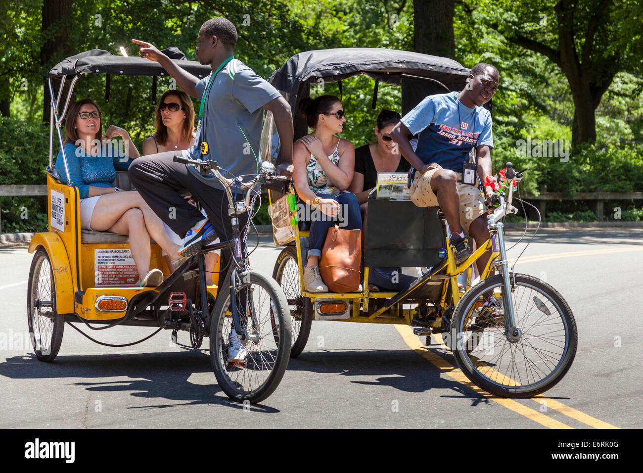 Tourists on a tricycle ride in Central Park, Manhattan, New York City, New York, USA Stock Photo