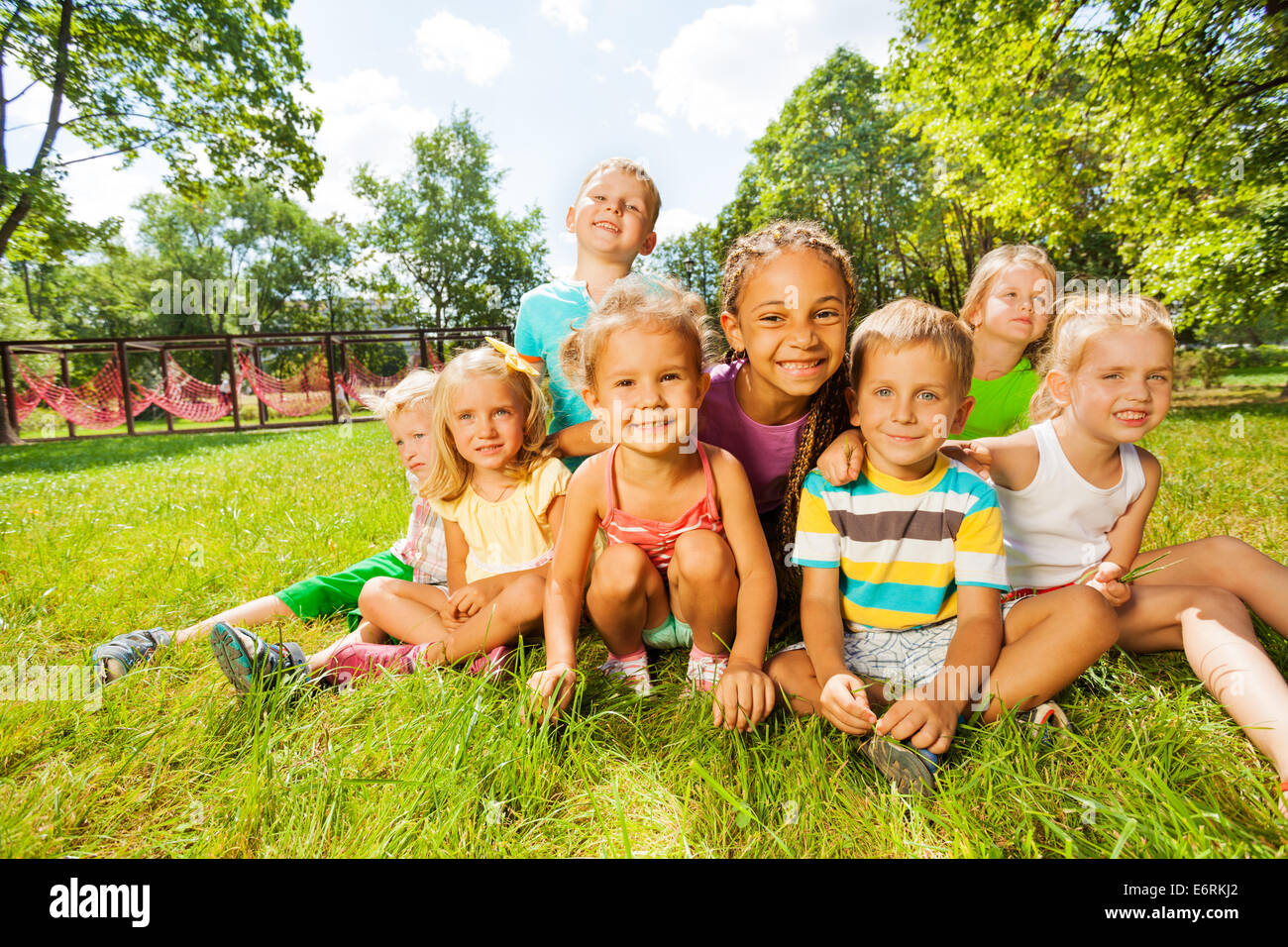 Group of little boys and girls on the lawn Stock Photo Alamy