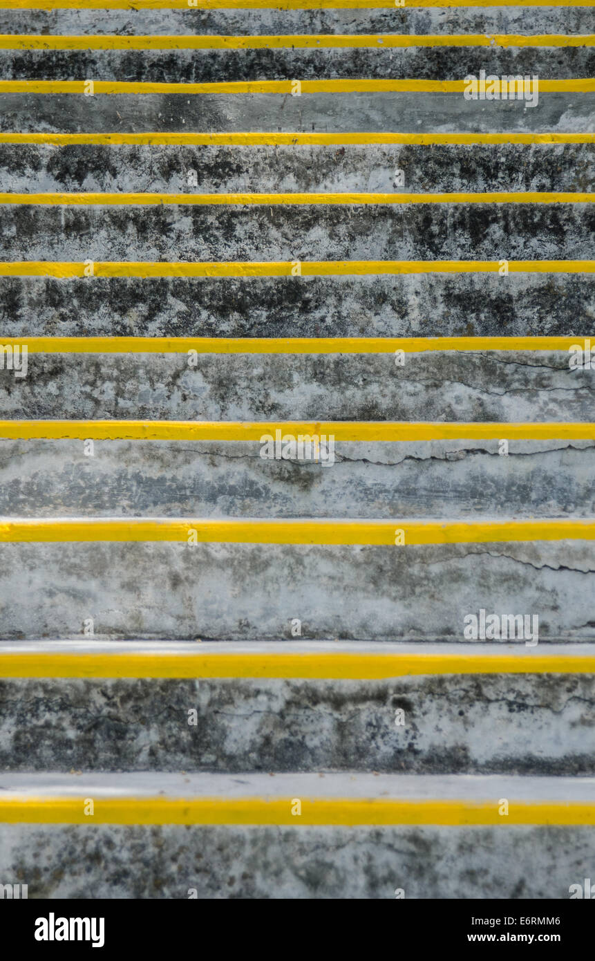 Concrete stairs are marked with yellow paint to clearly detail where each step is Stock Photo