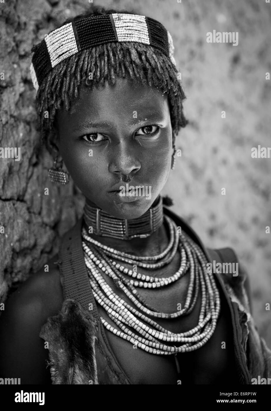 Hamer Tribe Girl In Traditional Outfit, Turmi, Omo Valley, Ethiopia Stock Photo