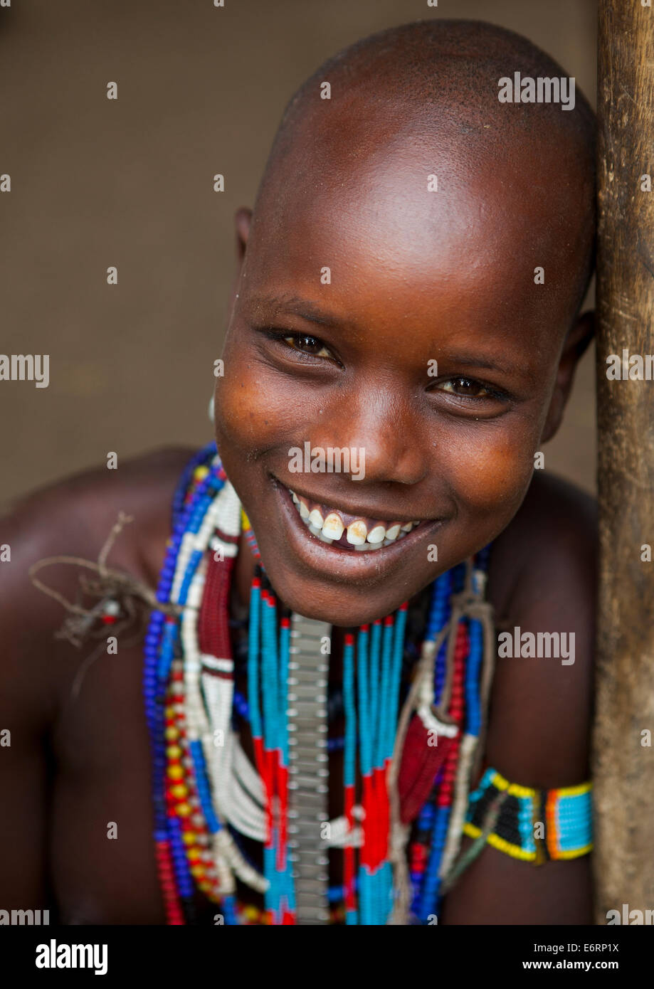 Portrait Of Beautiful Erbore Tribe Woman Wearing Beaded Necklace, Omo ...