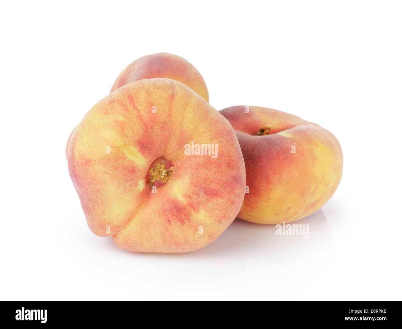 ripe flat donut peaches, isolated on white background Stock Photo Alamy
