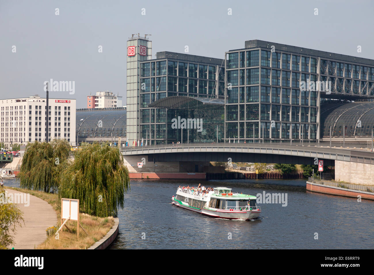 new main train station Hauptbahnhof and excursion boat on the river Spree in Berlin, Germany, Europe Stock Photo