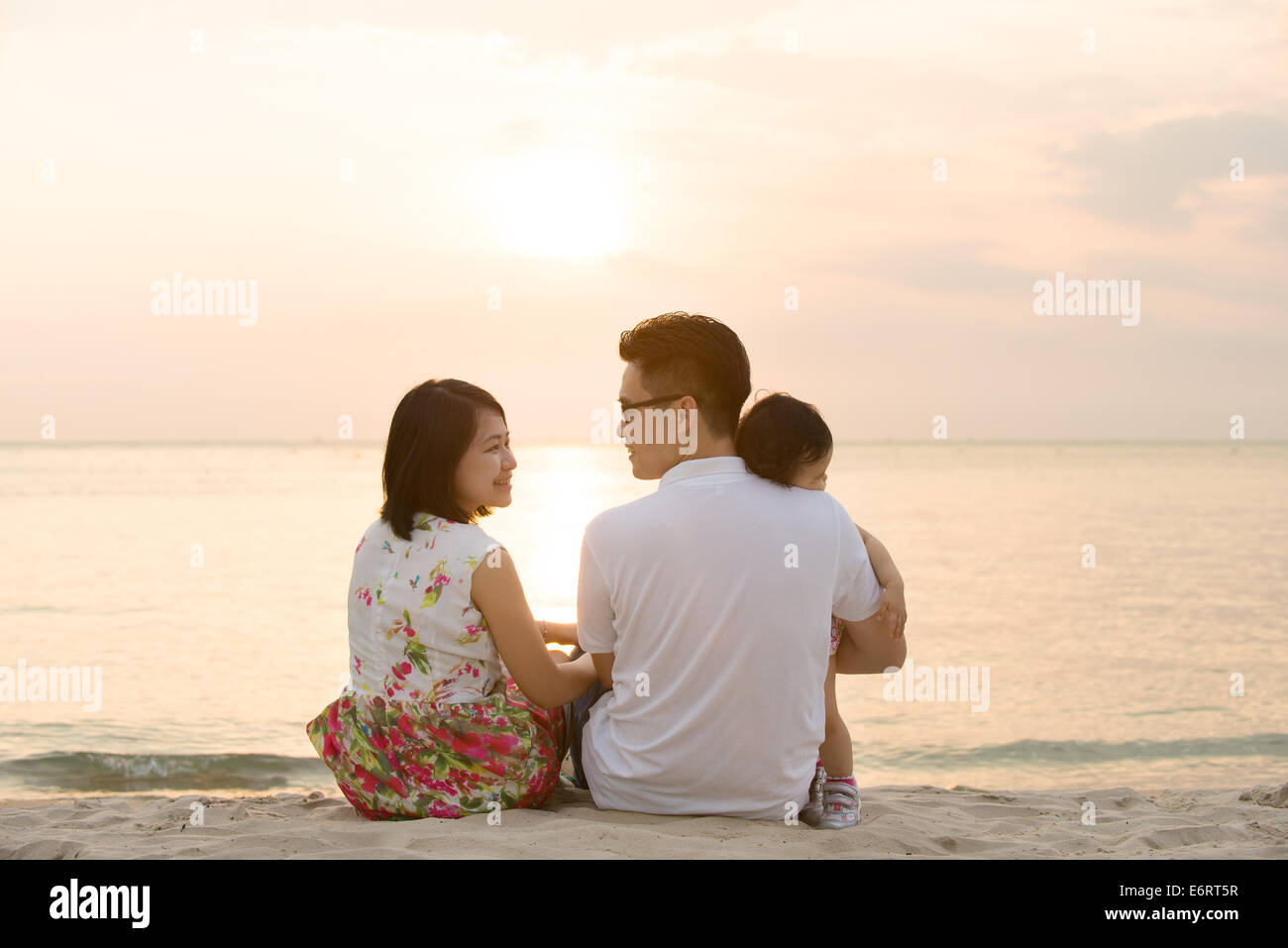 Asian family at the beach hi-res stock photography and images - Alamy