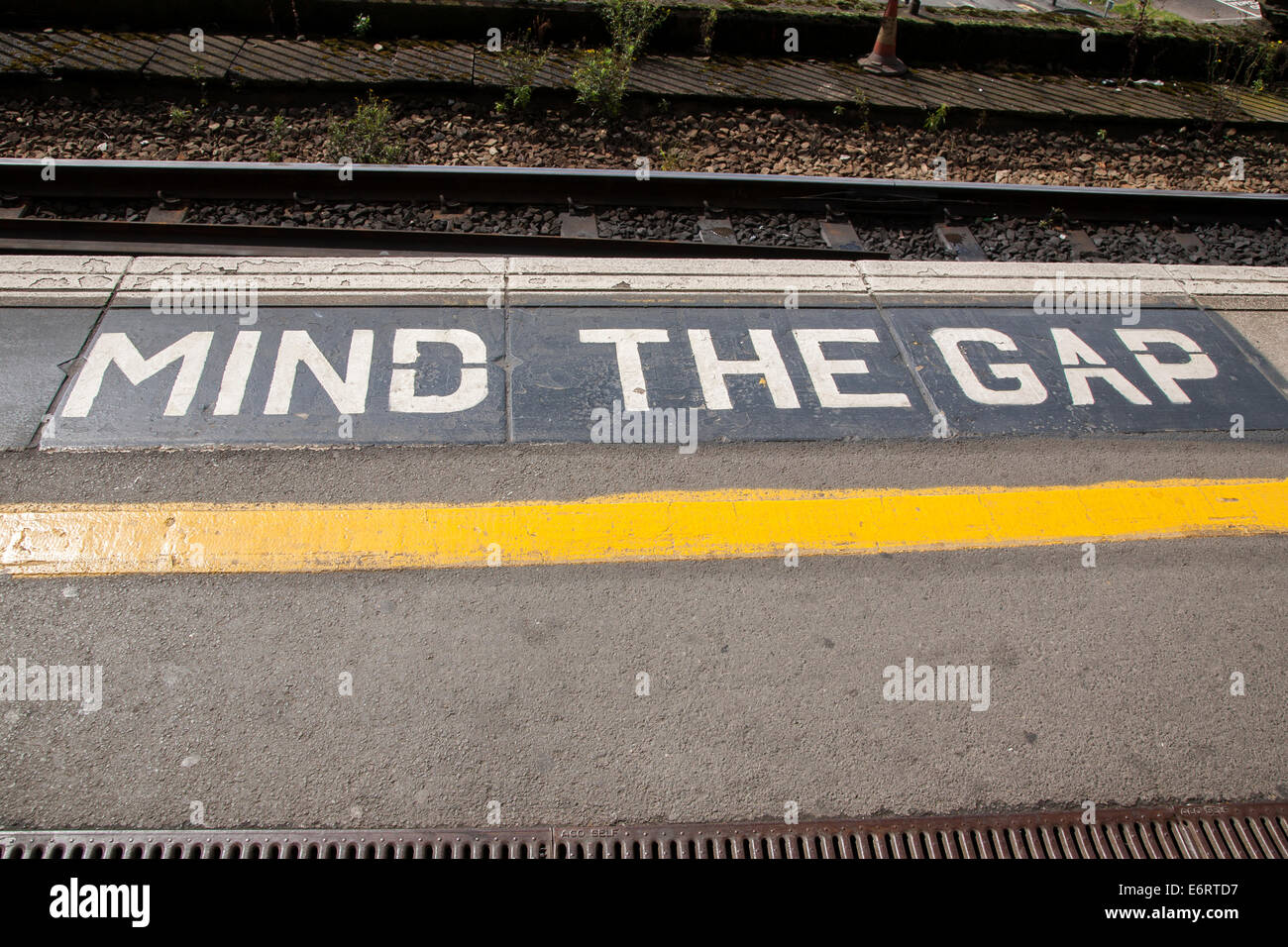 Closeup of Mind the Gap Platform Sign Stock Photo - Alamy