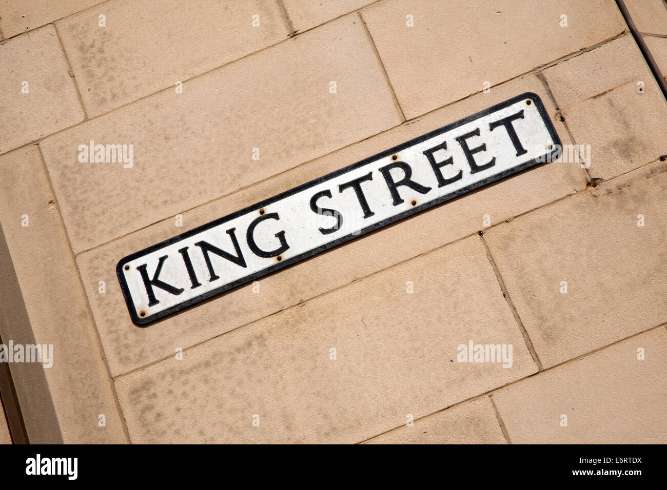 King Street Sign on Brick Wall on Diagonal Tilt Stock Photo Alamy