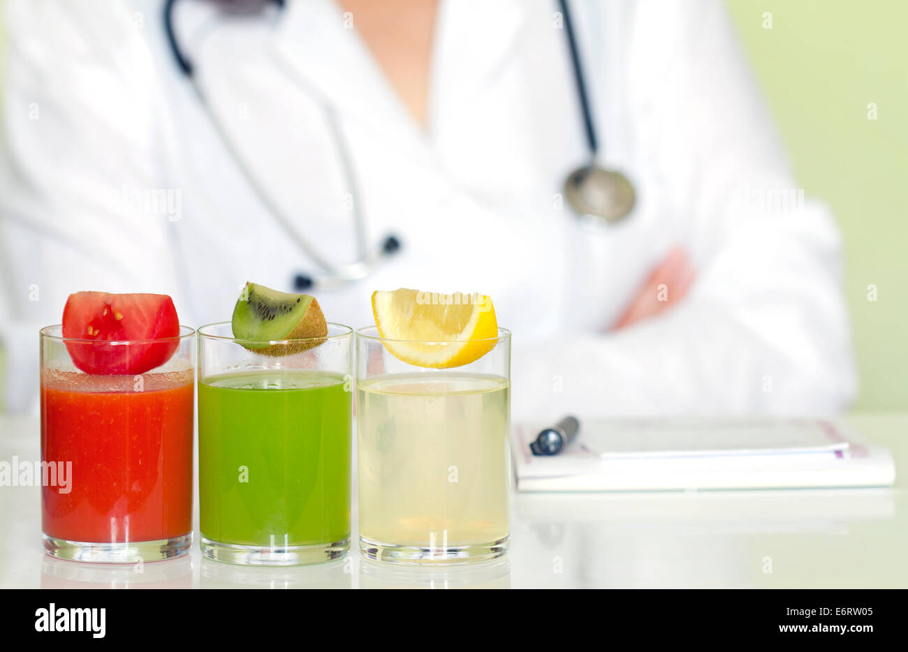Doctor nutritionist in office with healthy fruits diet concept Stock Photo