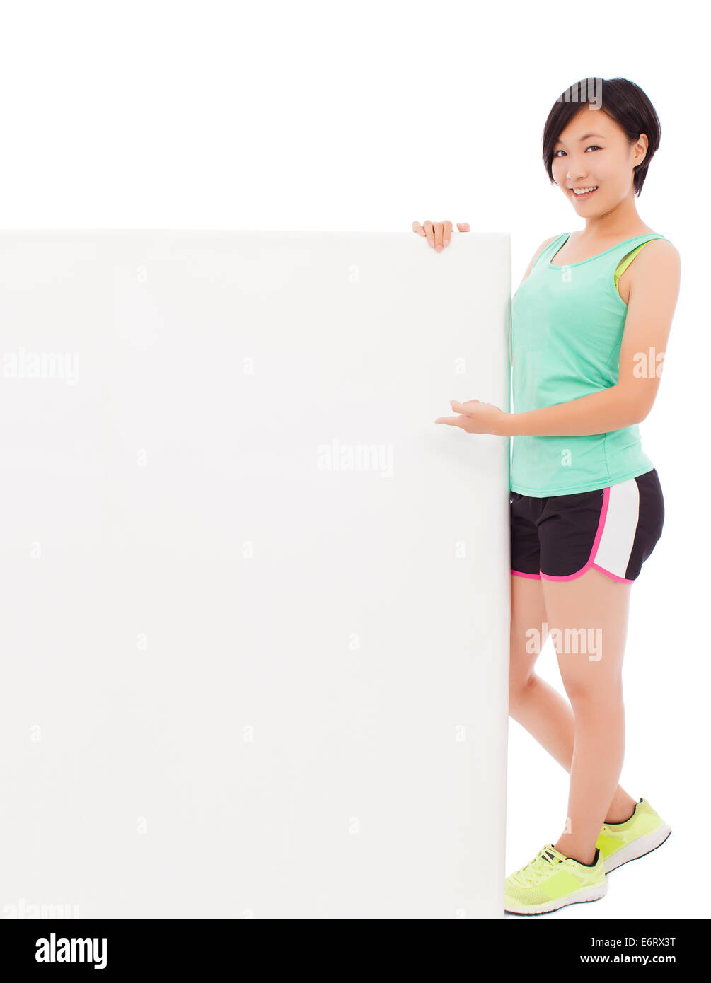 young female athletes holding a empty board Stock Photo