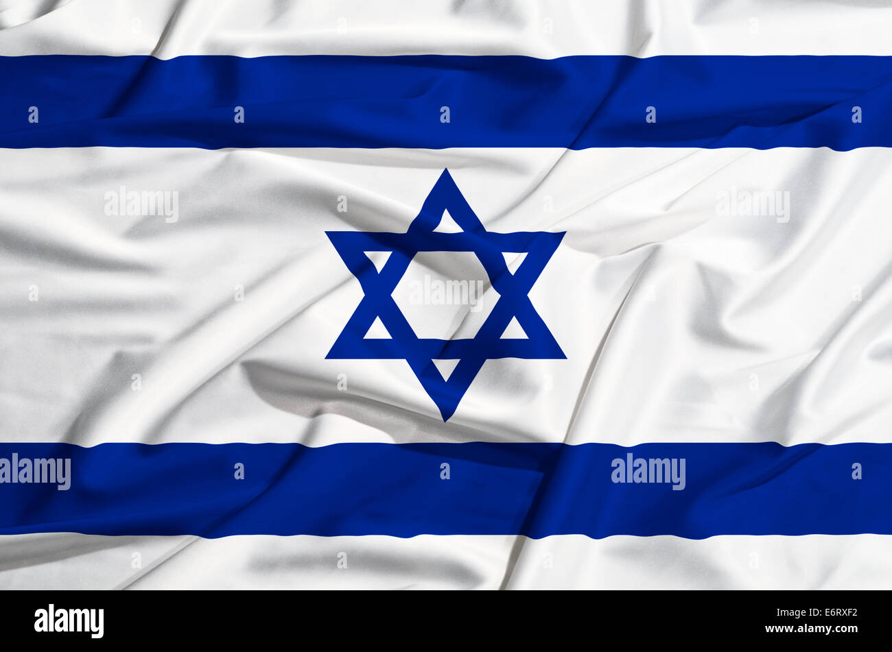 Israel flag on a silk drape waving Stock Photo