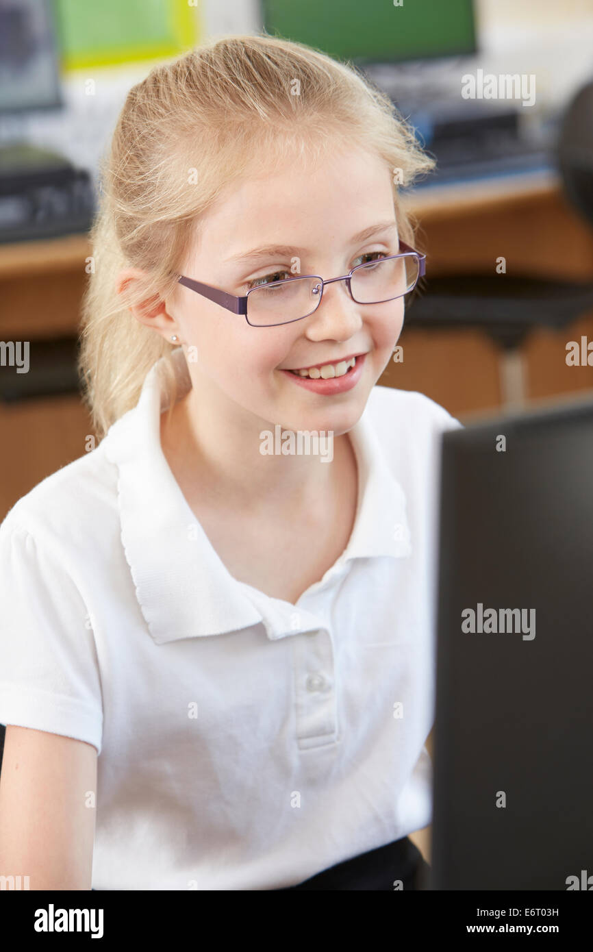 Female Elementary School Pupil In Computer Class Stock Photo - Alamy