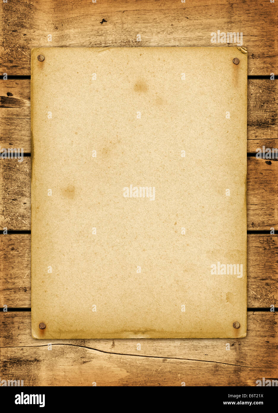 Blank vintage poster nailed on a wood board panel Stock Photo