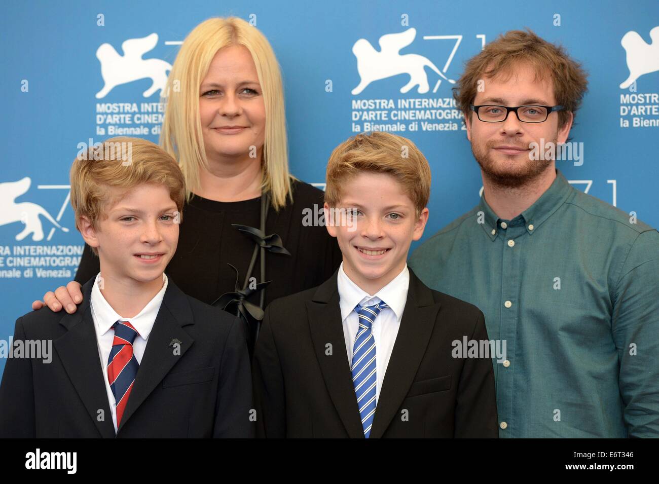 Venice, Italy. 30th Aug, 2014. Director Veronika Franz (back, L) and Severin Fiala (back, R), actor Elias Schwarz (front L) and Lukas Schwarz pose during the photo call for the movie 'Ich Seh Ich Seh' ('Goodnight Mommy') which is selected for the horizons competition during the 71st Venice Film Festival in Lido of Venice, Italy, on Aug. 30, 2014. Credit:  Liu Lihang/Xinhua/Alamy Live News Stock Photo