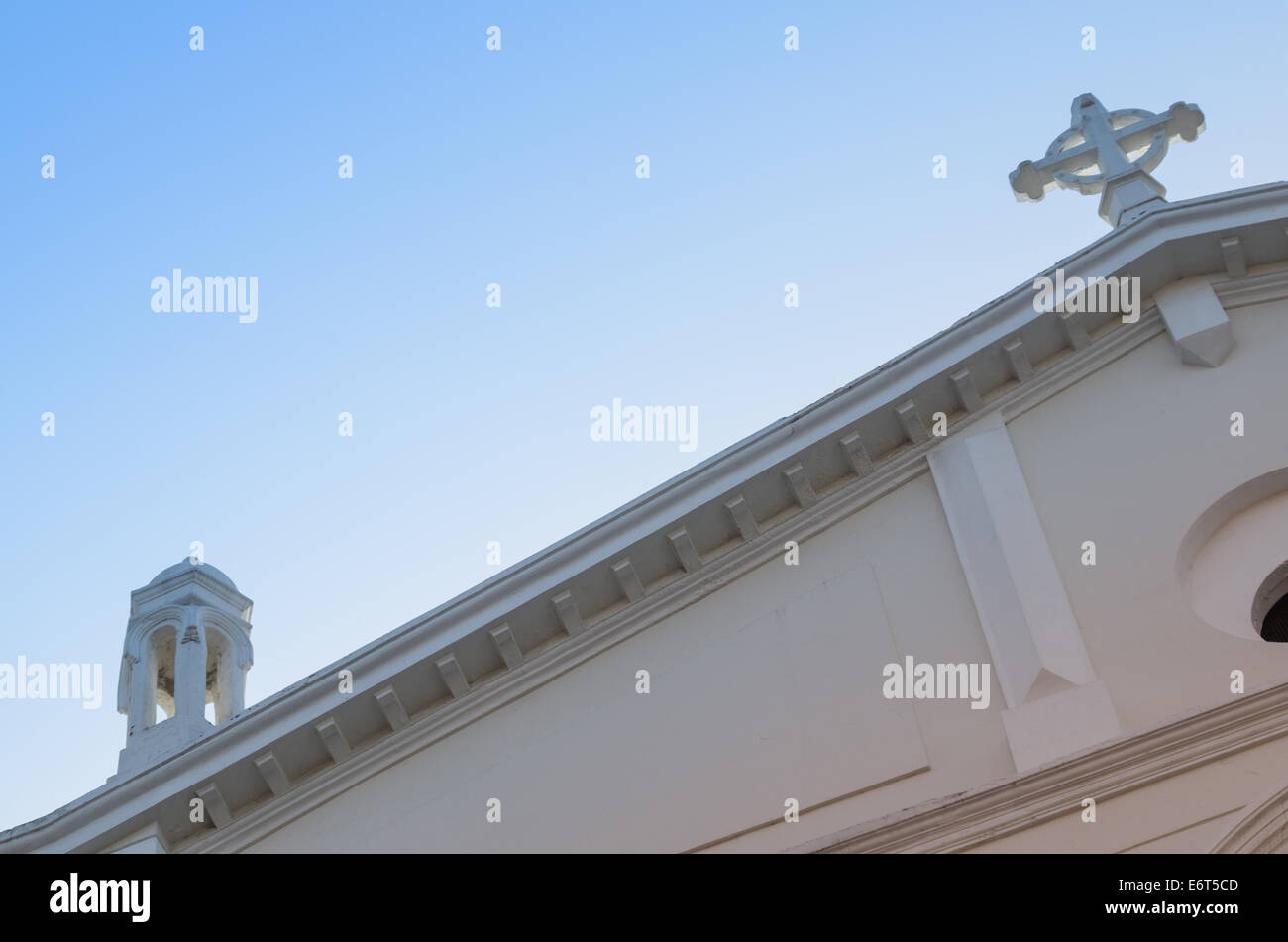 Church roof with Latin cross, angle view Stock Photo