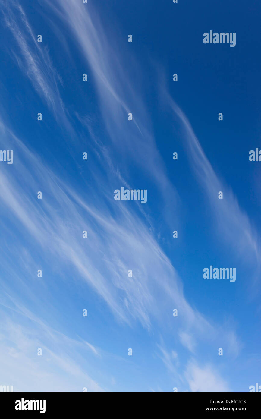 A background image of a blue sky with wispy white cirrus clouds in ...