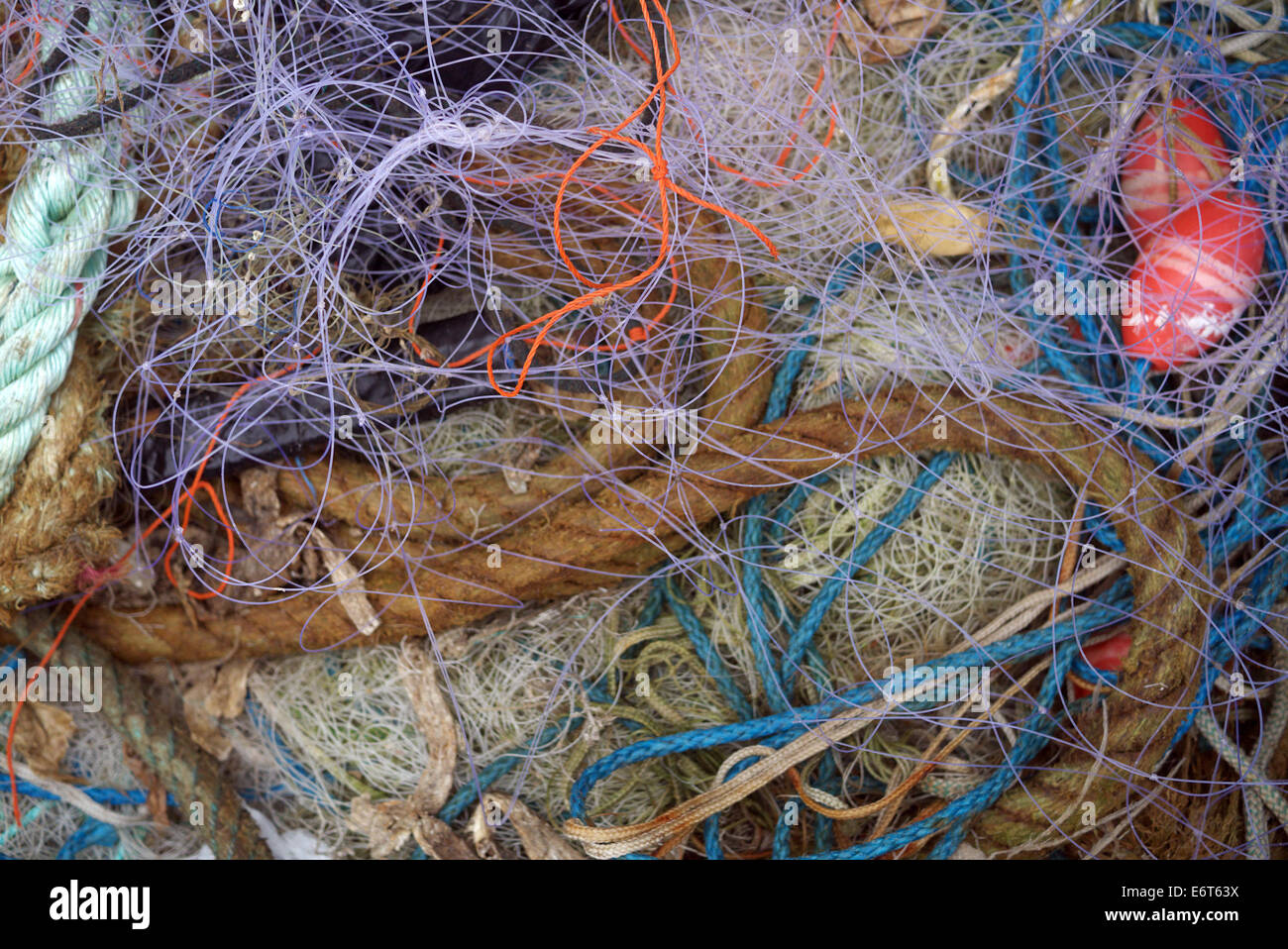 Fishing boat still life, showing nets, buoys and various trawler and