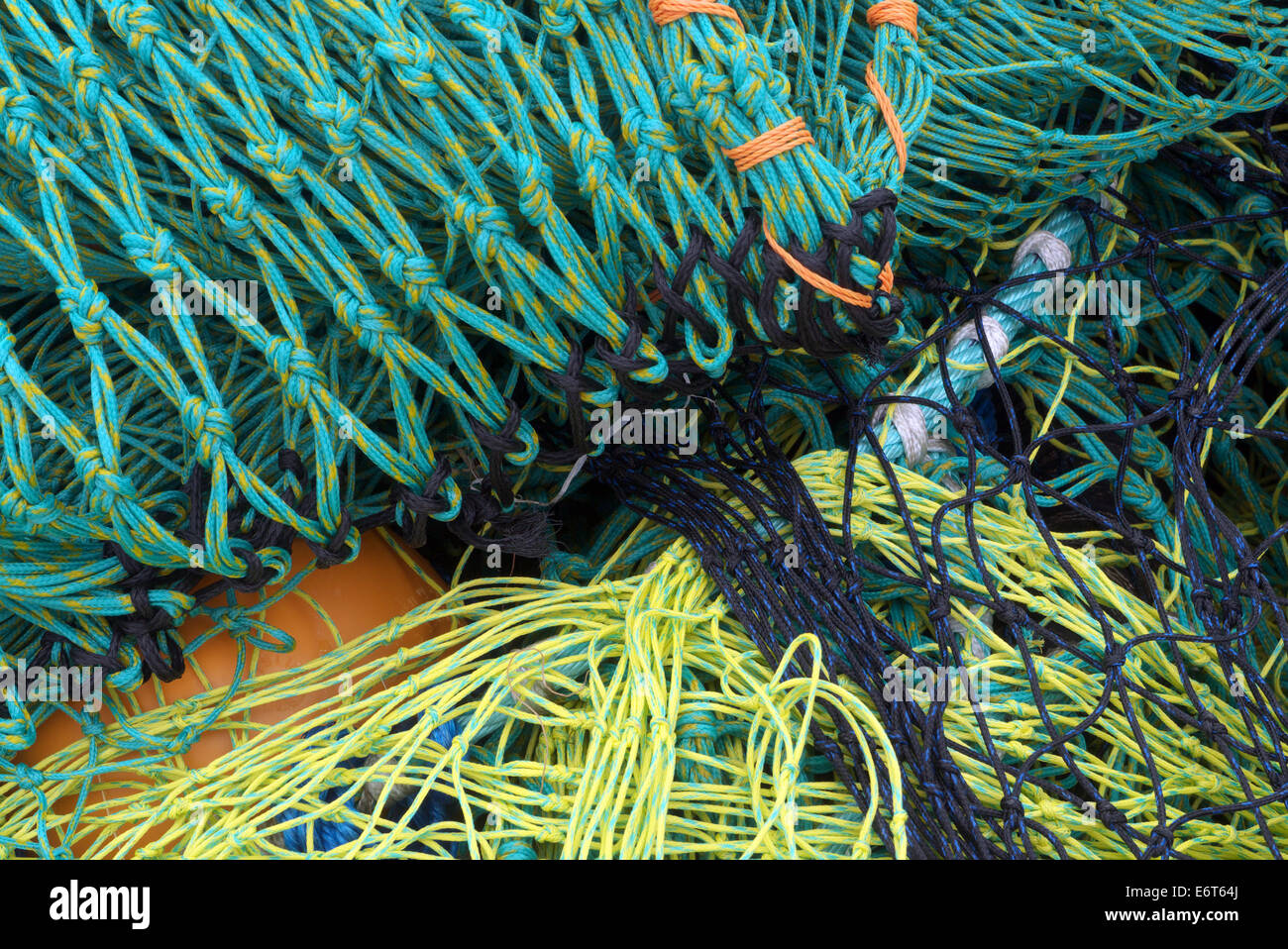 Fishing boat still life, showing nets, buoys and various trawler and