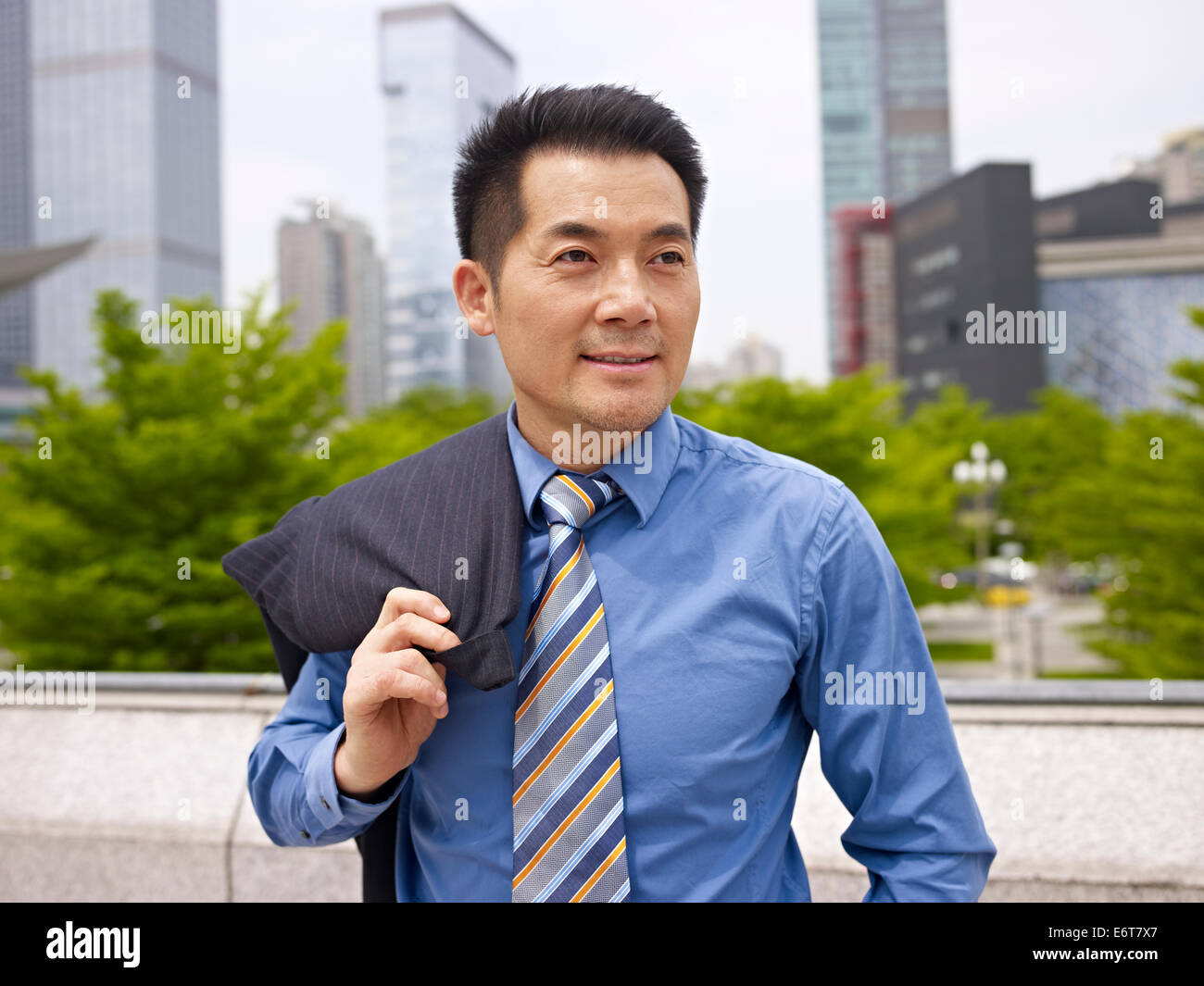 Asian business man looking away hi-res stock photography and images - Alamy