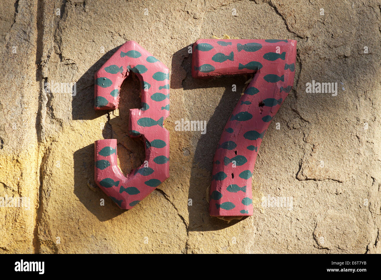 House numbers in different styles and colors (concept for real estate