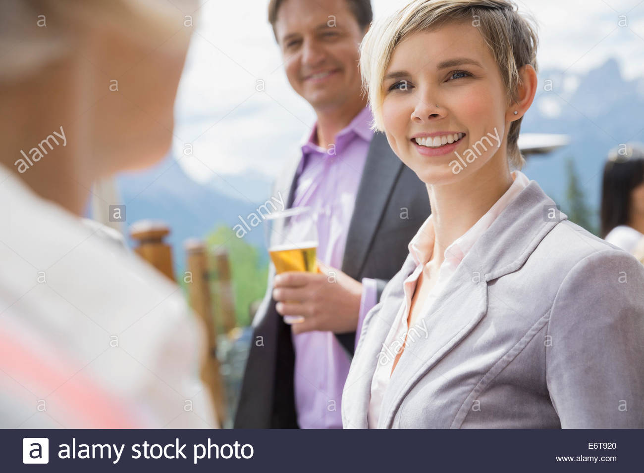 Business people talking at networking event Stock Photo