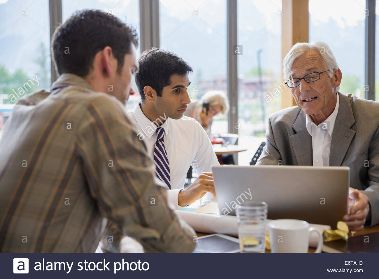 Businessmen talking in meeting Stock Photo