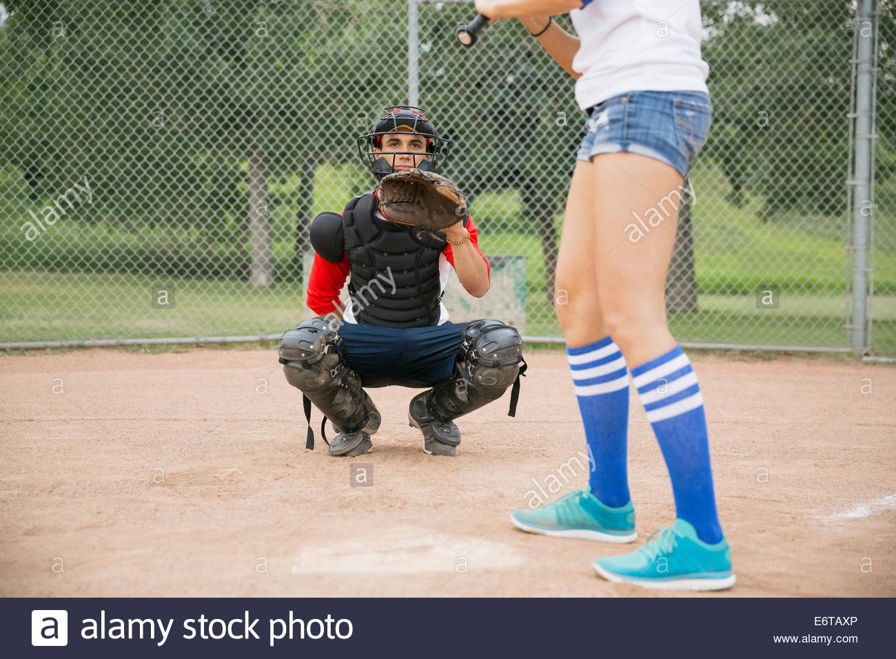 Catcher ready for ball at home plate Stock Photo Alamy