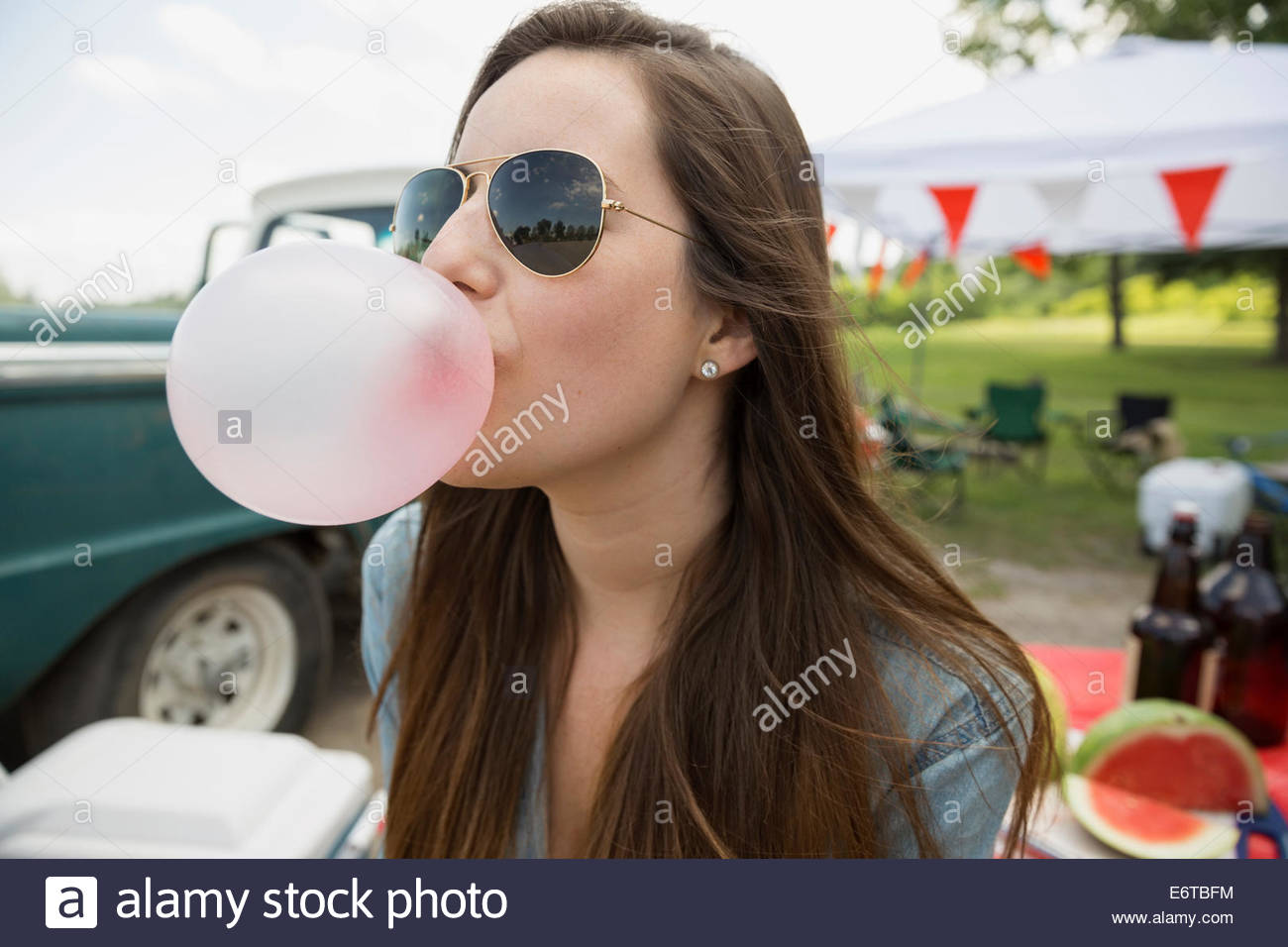 Woman blowing bubble gum hi-res stock photography and images - Alamy