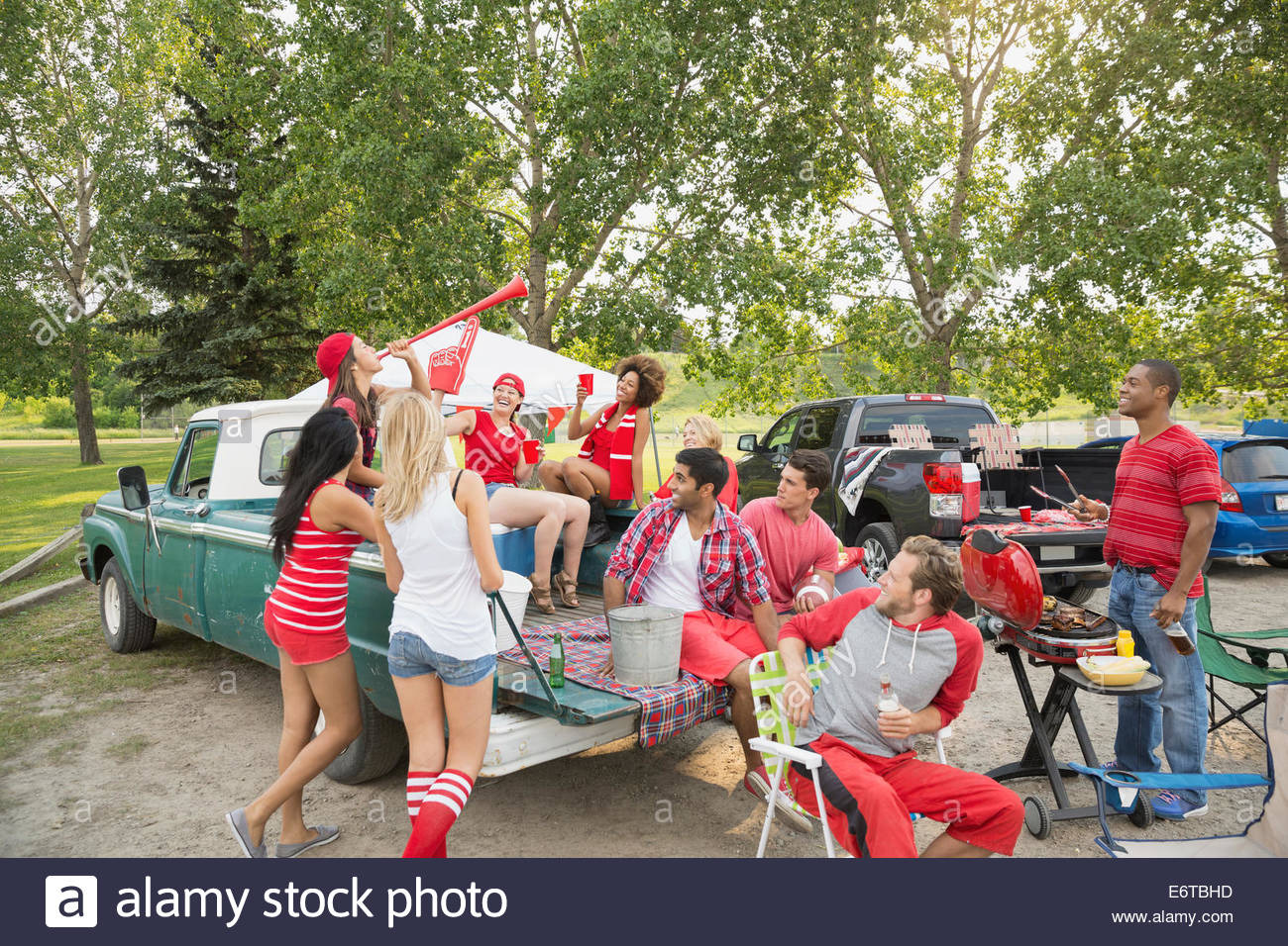 Blowing horn woman hires stock photography and images Alamy