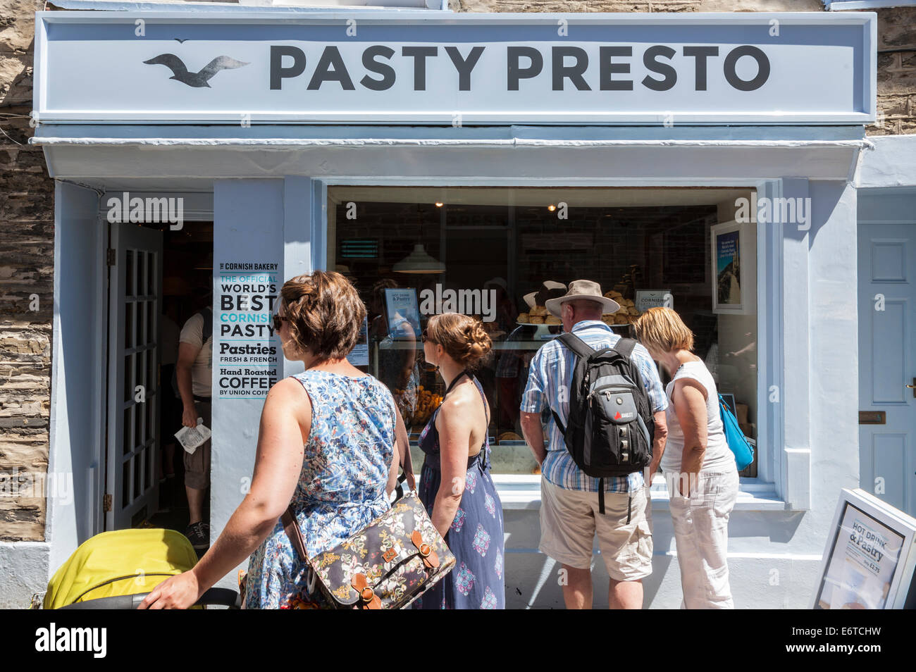 Tourists outside Cornish pasty shops in Padstow, Cornwall, England, UK