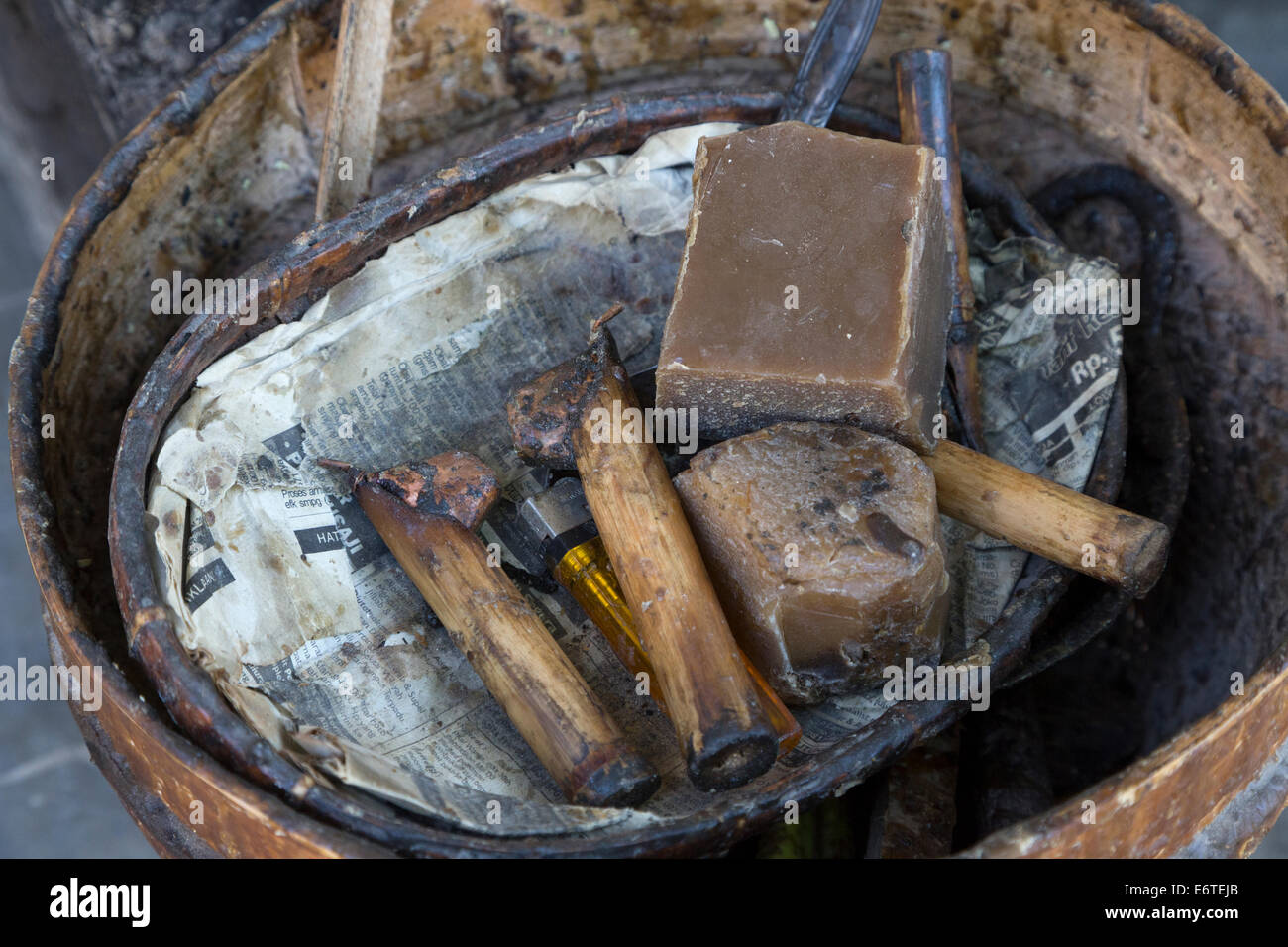 Yogyakarta, Java, Indonesia.  Wax to be Melted and Used to Draw Batik Designs. Stock Photo