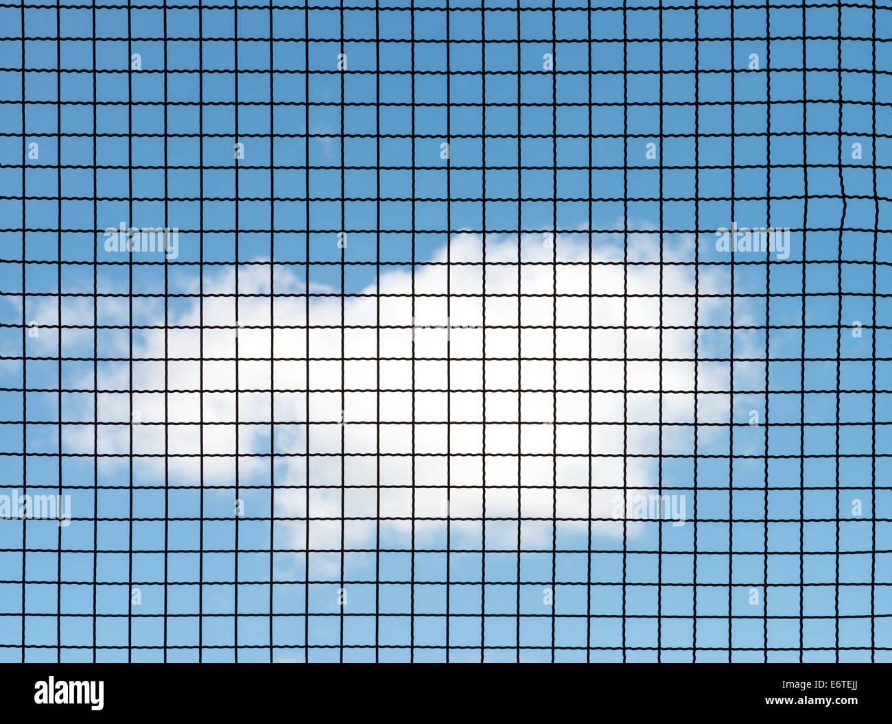 Metal mesh wire fence with blue sky and cloud background Stock Photo ...