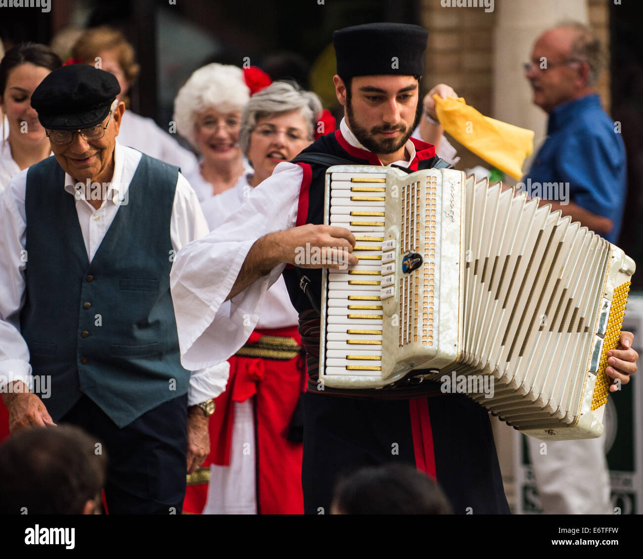 Ohio, US. 30th Aug, 2014. Mattteo Amburgy leads out the Hellenic Singers during the 2014 Columbus Greek Festival. Credit:  Brent Clark/Alamy Live News Stock Photo