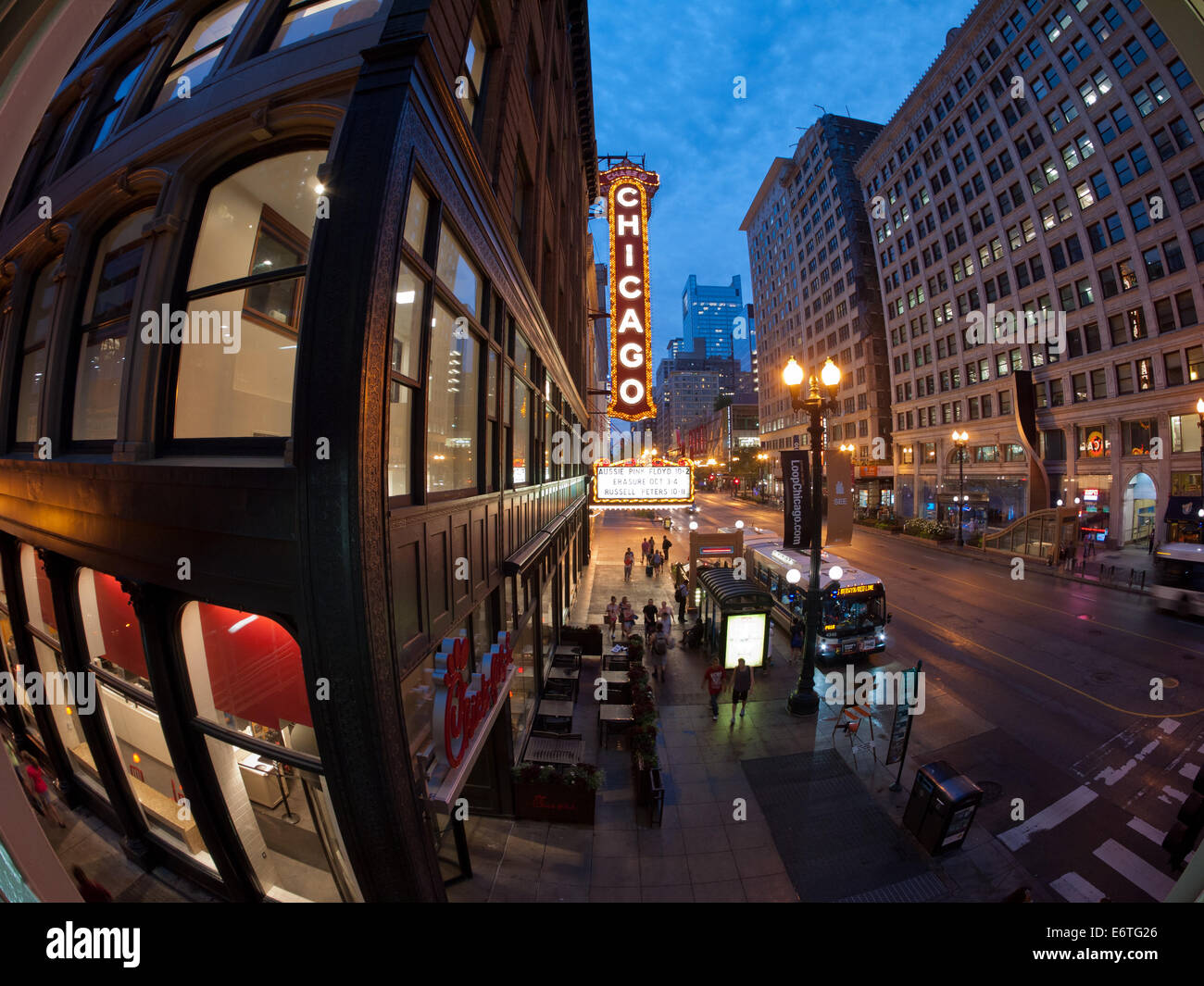 A night, fisheye view of the corner of North State Street, East Lake Street and the Chicago Theatre in Loop District of Chicago. Stock Photo