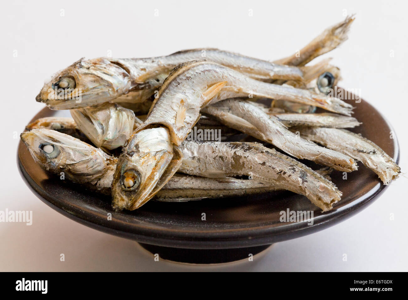 Dried Japanese anchovies (Engraulis japonicus) on dish Stock Photo Alamy