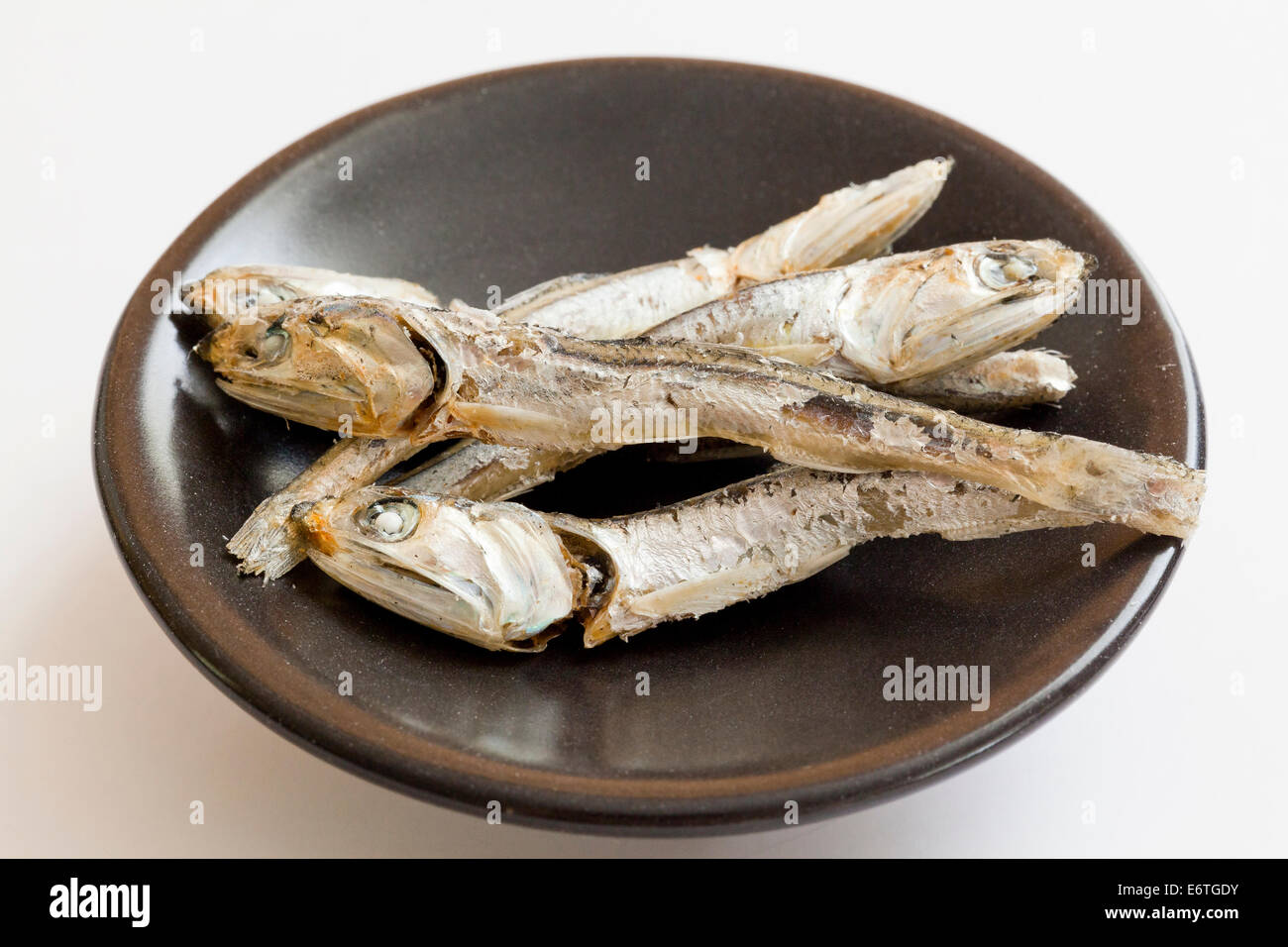 Dried Japanese anchovies (Engraulis japonicus) on dish Stock Photo Alamy