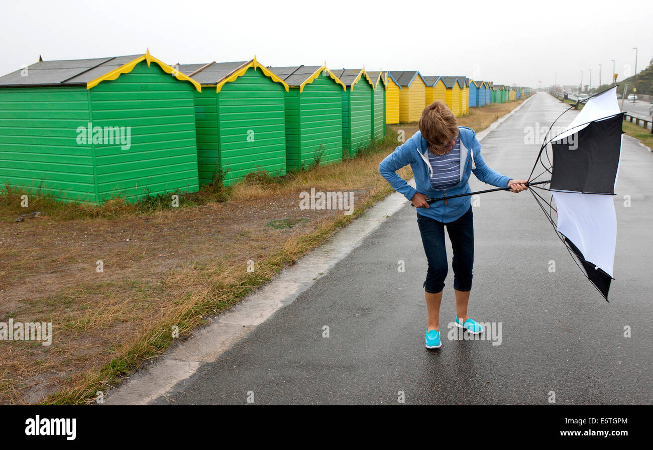 Struggling with wind hi-res stock photography and images - Alamy