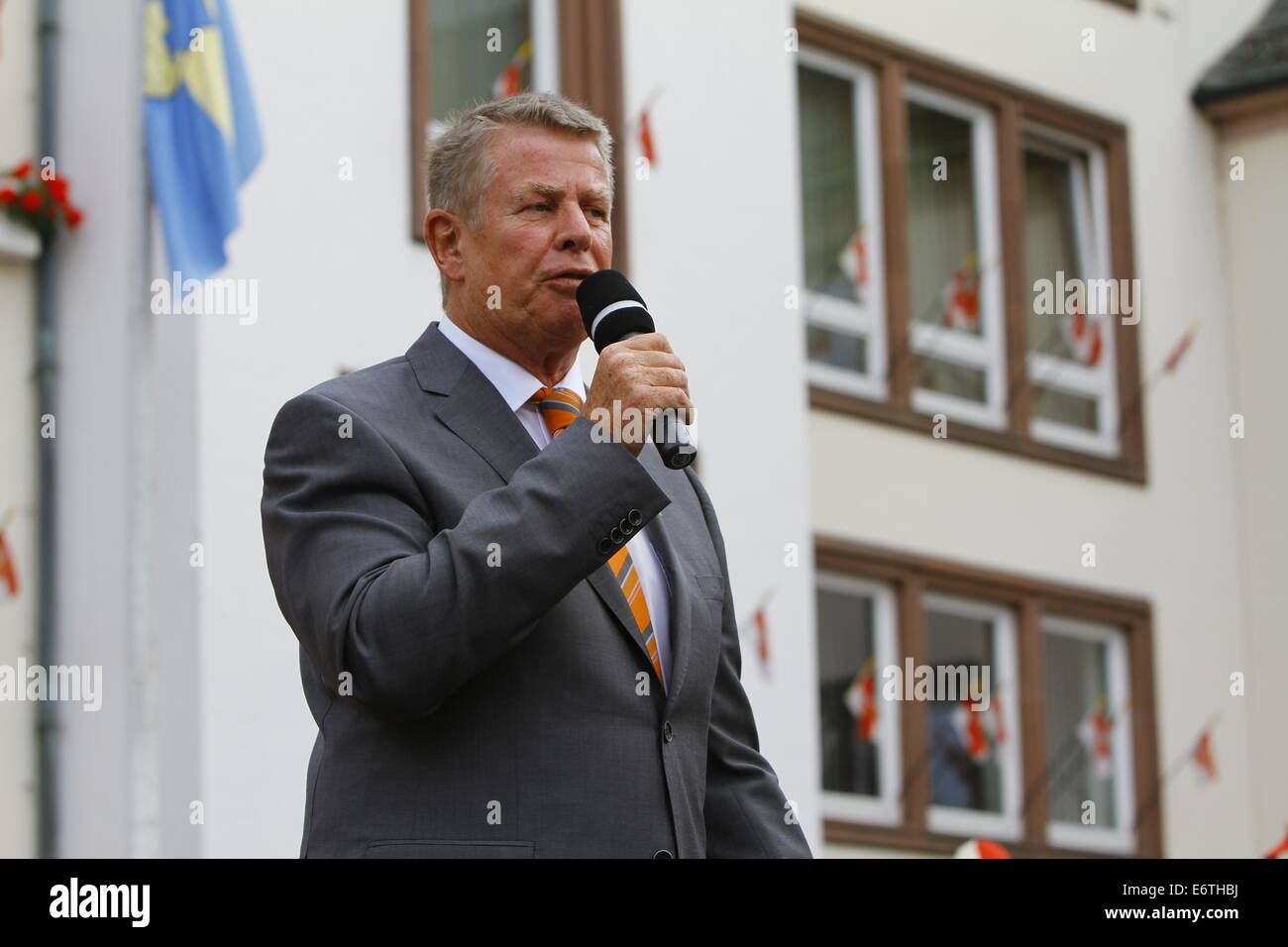 Germany. 30th Aug, 2014. The Lord Mayor of Worms, Michael Kissel (SPD), addresses the opening ceremony of the Backfischfest 2014. The Backfischfest started in Worms with the traditional handing over of power from the Lord Mayor to the Mayor of the FishermenÕs Lea. It is the largest wine fair along the Rhine that includes music and dances. Credit:  Michael Debets/Pacific Press/Alamy Live News Stock Photo