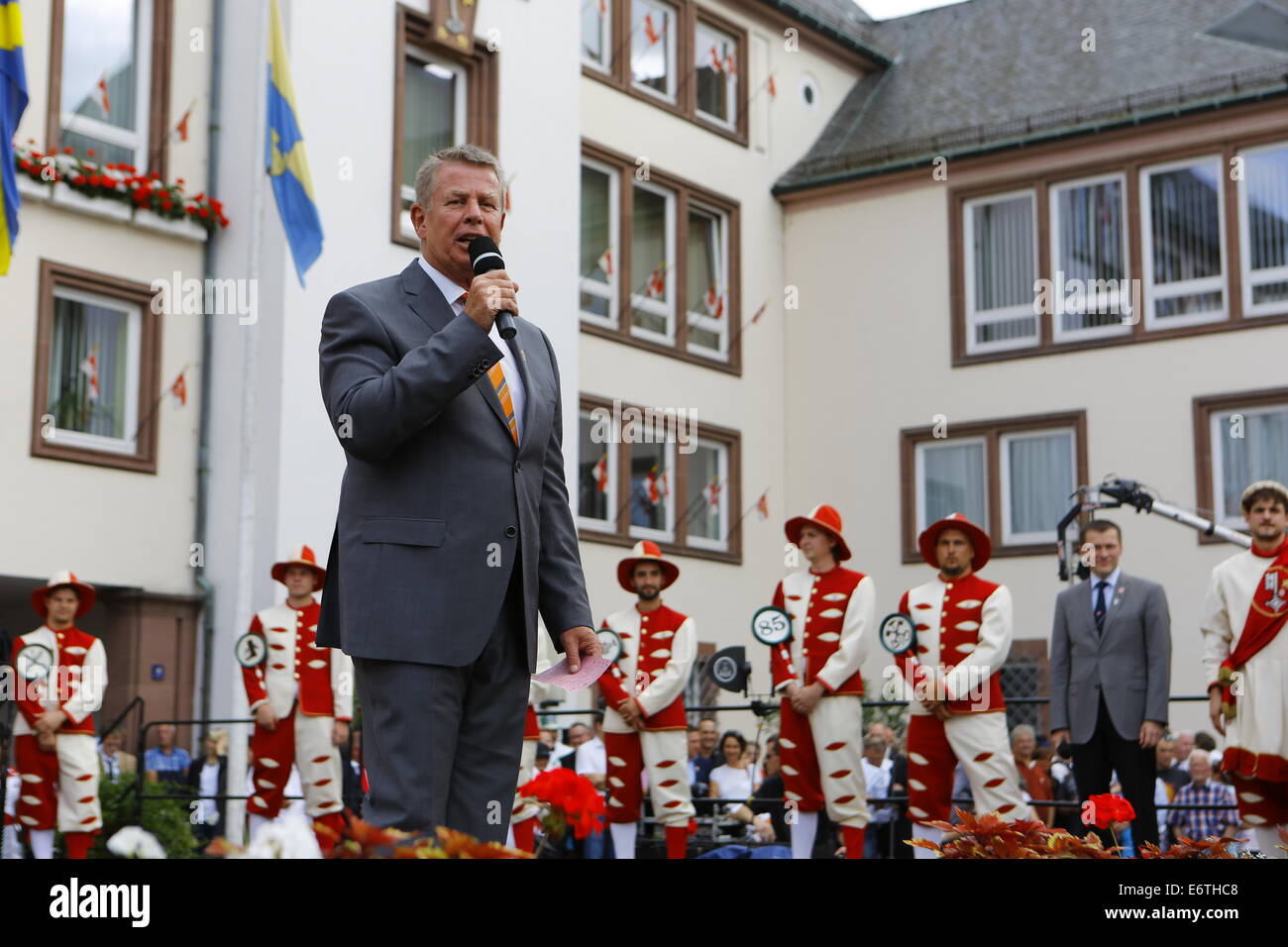 Germany. 30th Aug, 2014. The Lord Mayor of Worms, Michael Kissel (SPD), addresses the opening ceremony of the Backfischfest 2014. The Backfischfest started in Worms with the traditional handing over of power from the Lord Mayor to the Mayor of the FishermenÕs Lea. It is the largest wine fair along the Rhine that includes music and dances. Credit:  Michael Debets/Pacific Press/Alamy Live News Stock Photo