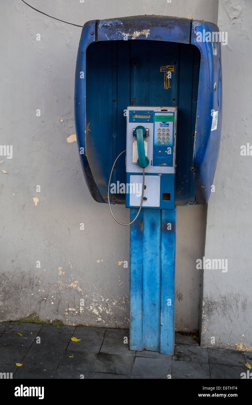 Yogyakarta, Java, Indonesia.  Coin-operated Public Telephone in use in 2014. Stock Photo