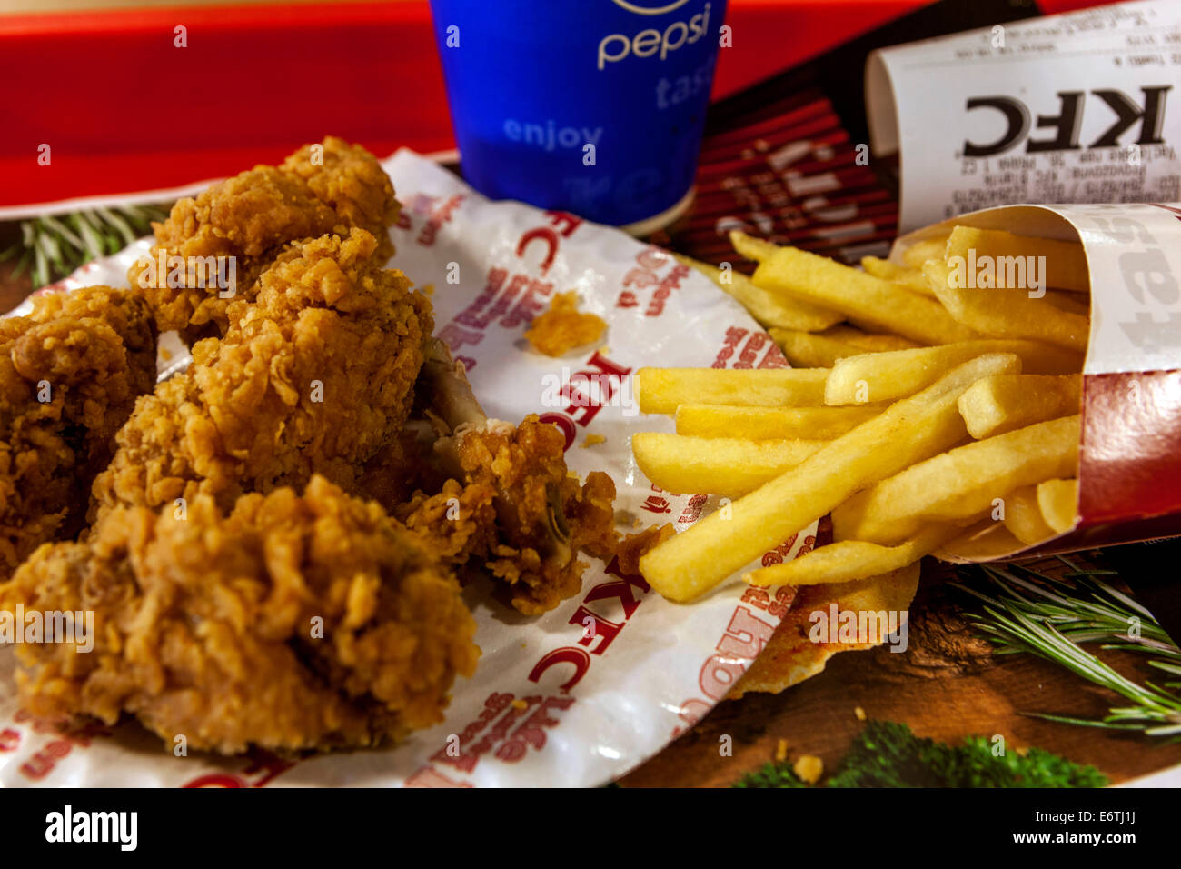 KFC meal, hot wings menu, food on tray chicken chips Stock Photo