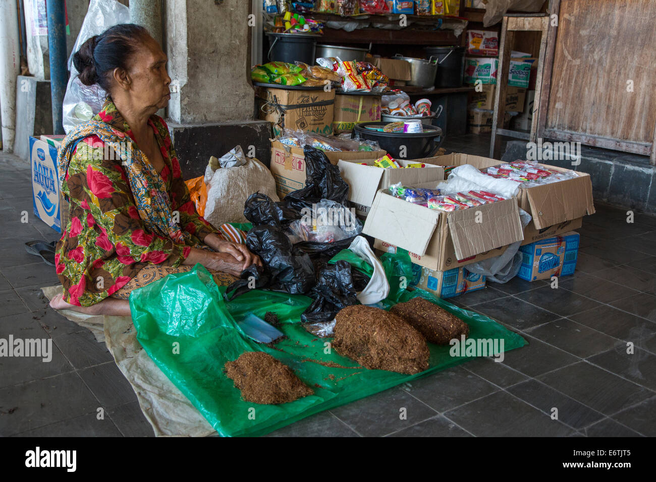 Yogyakarta, Java, Indonesia.  Woman Selling Tobacco, Beringharjo Market. Stock Photo