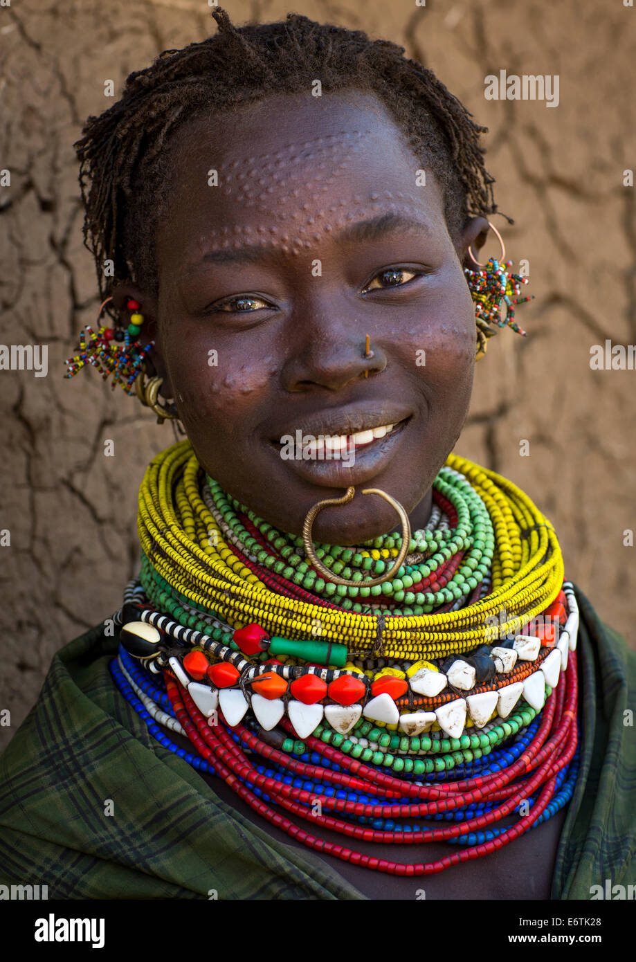 Portrait Of A Topossa Woman, With Traditional Clothes, Omo Valley, Kangate, Ethiopia Stock Photo