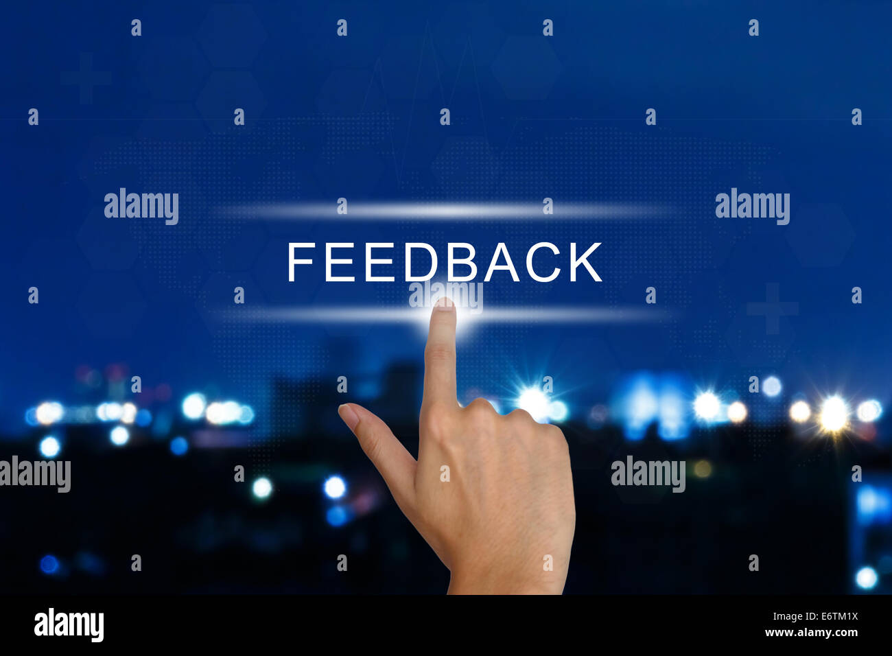 hand clicking feedback button on a touch screen interface Stock Photo