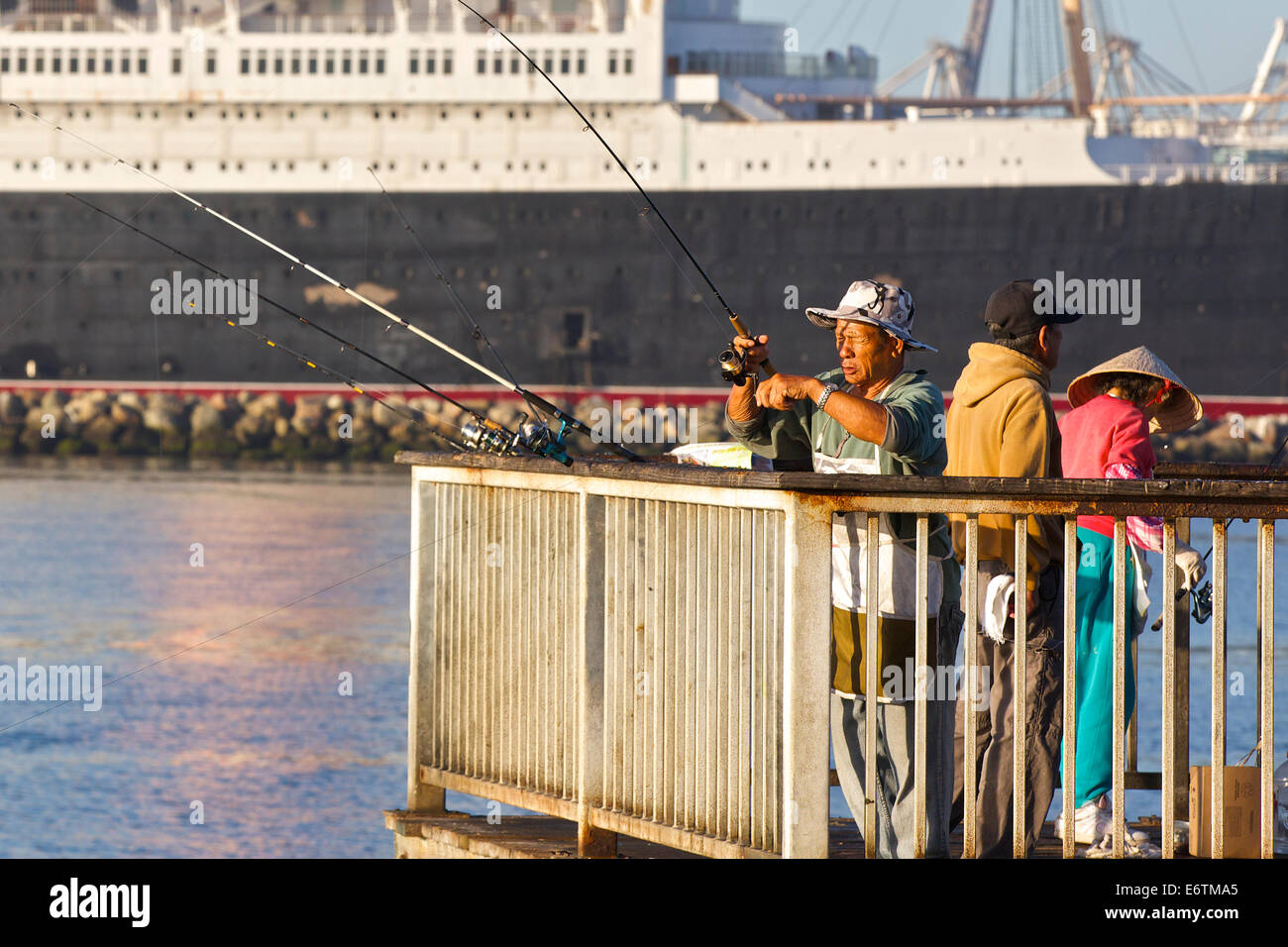 Fishing By The Queen. Long Beach, California. Stock Photo