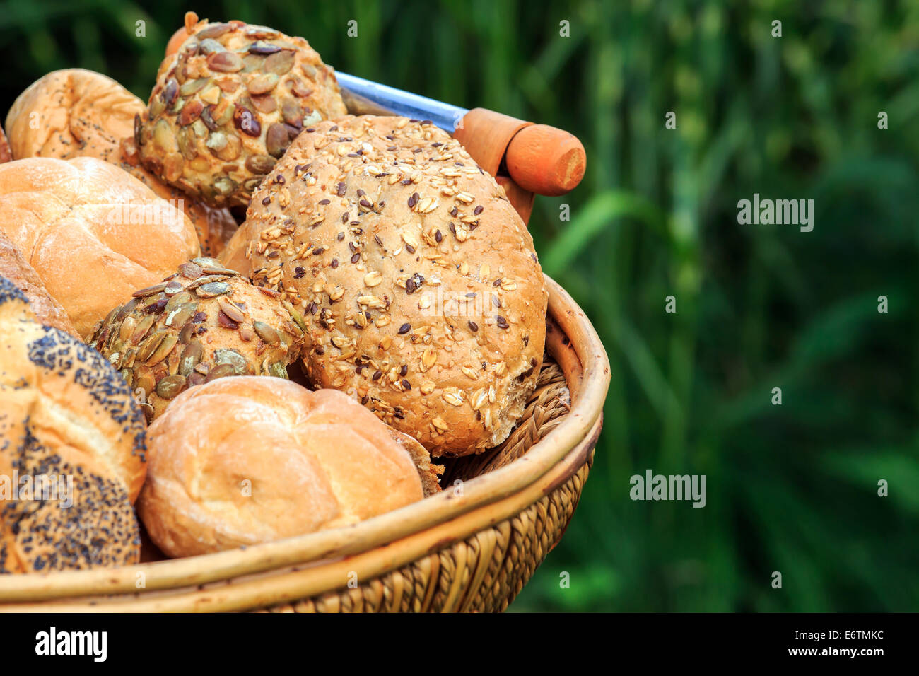 Basket full of different types of bread Stock Photo Alamy