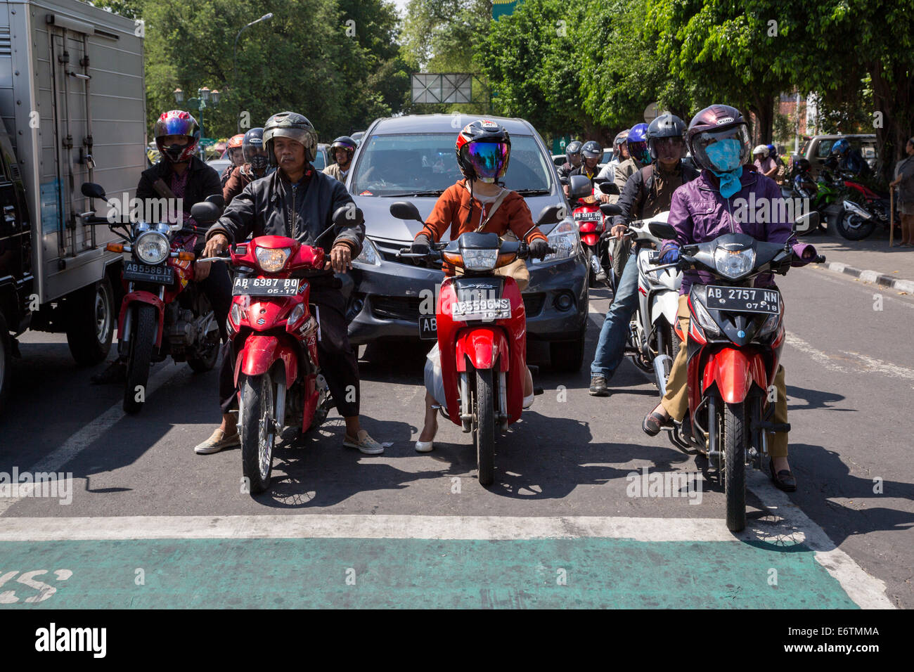 Yogyakarta, Java, Indonesia. Street Traffic, Motorbikes. Note Breathing ...