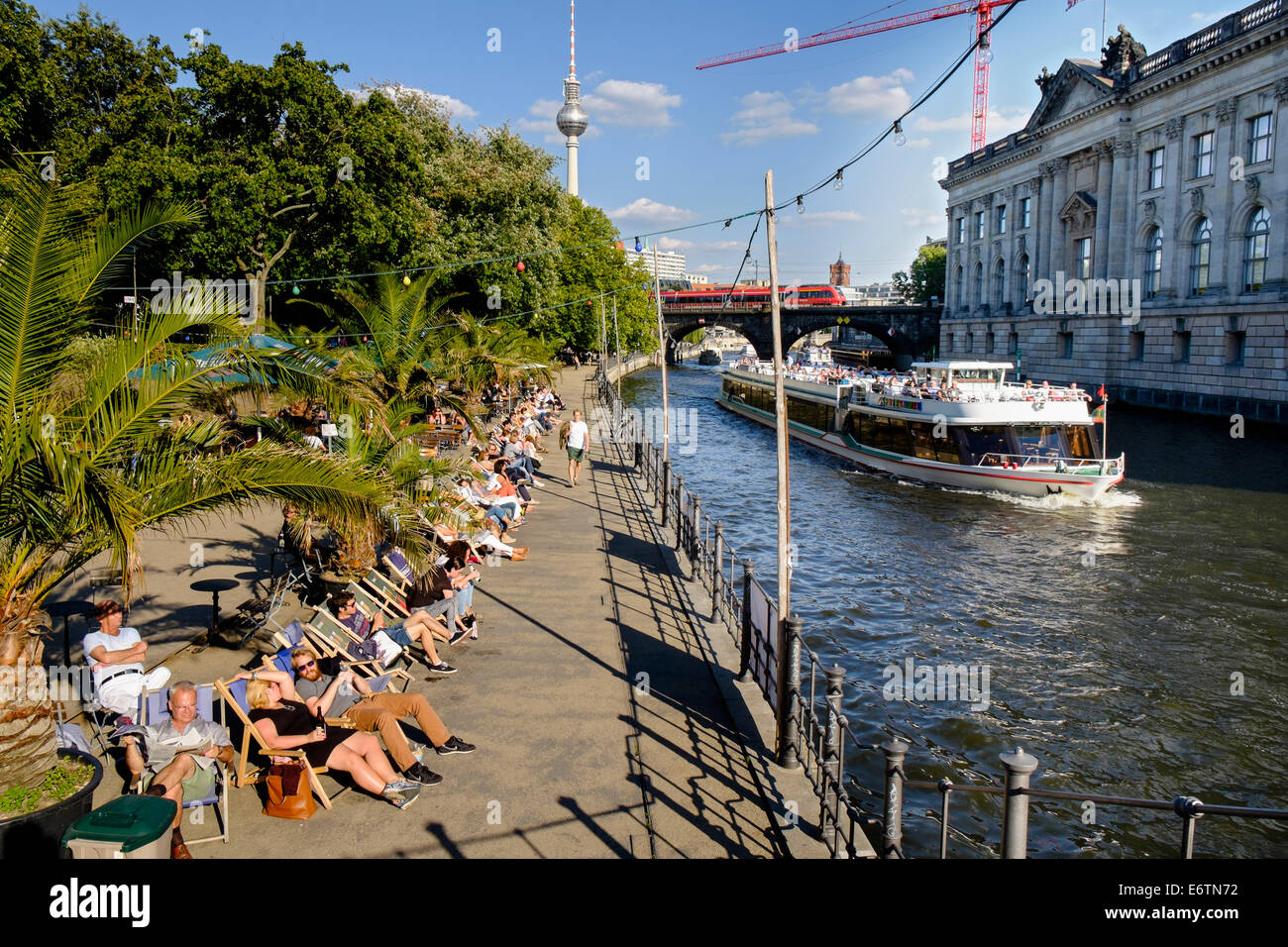 Berlin Riverside Summer afternoon view of riverside bar and cafe in Monbijoupark beside ...